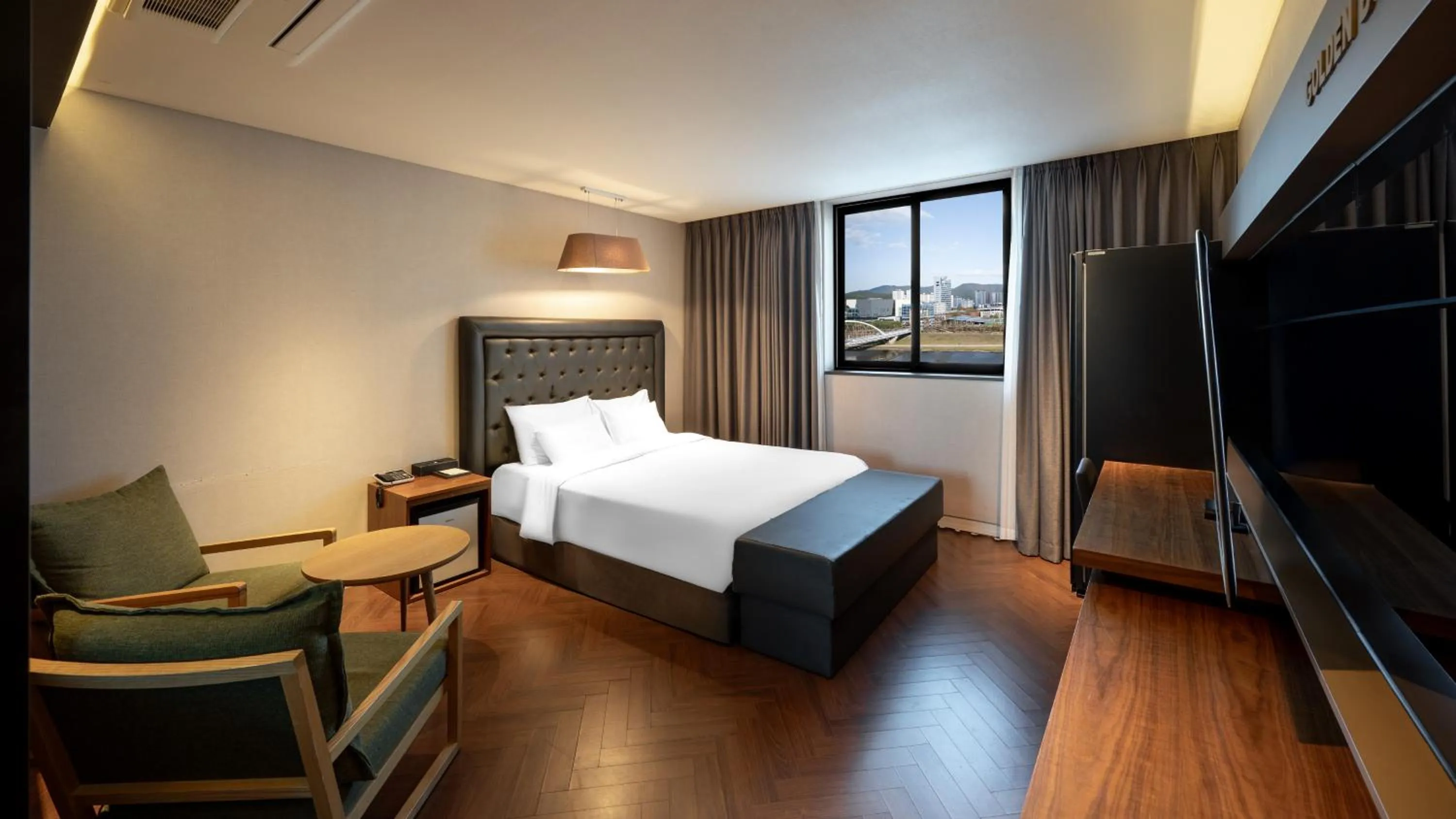 Bed in Golden Business Hotel