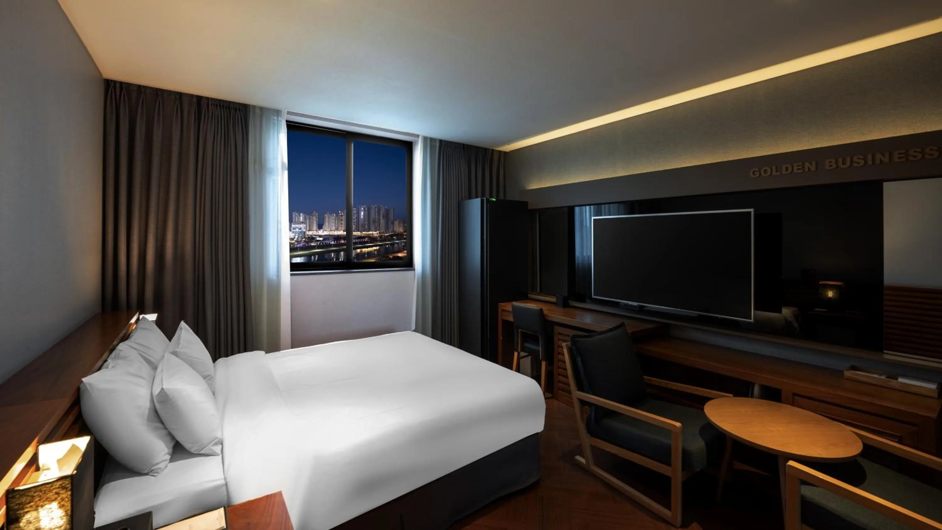 Bed in Golden Business Hotel