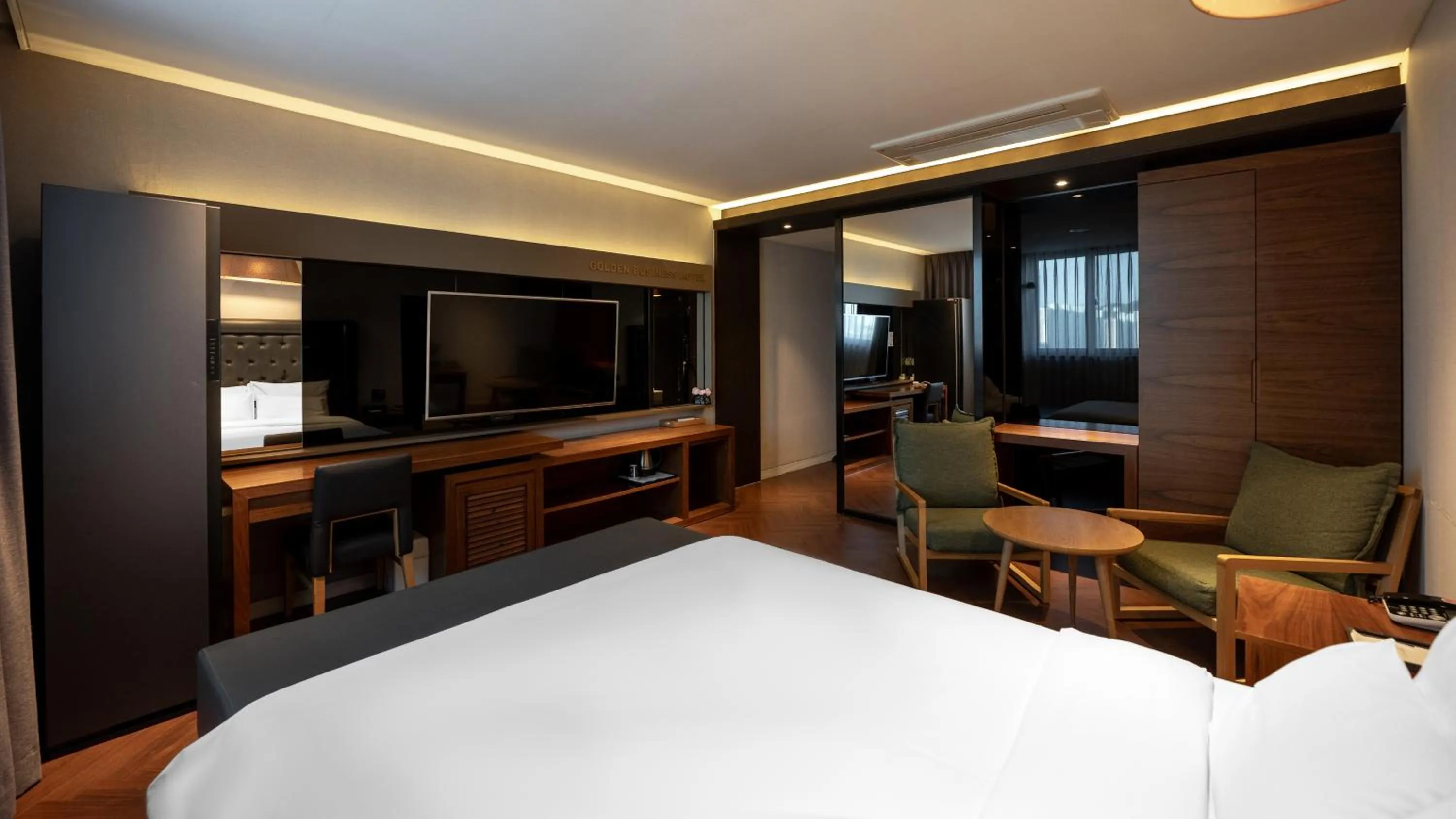 Bed in Golden Business Hotel