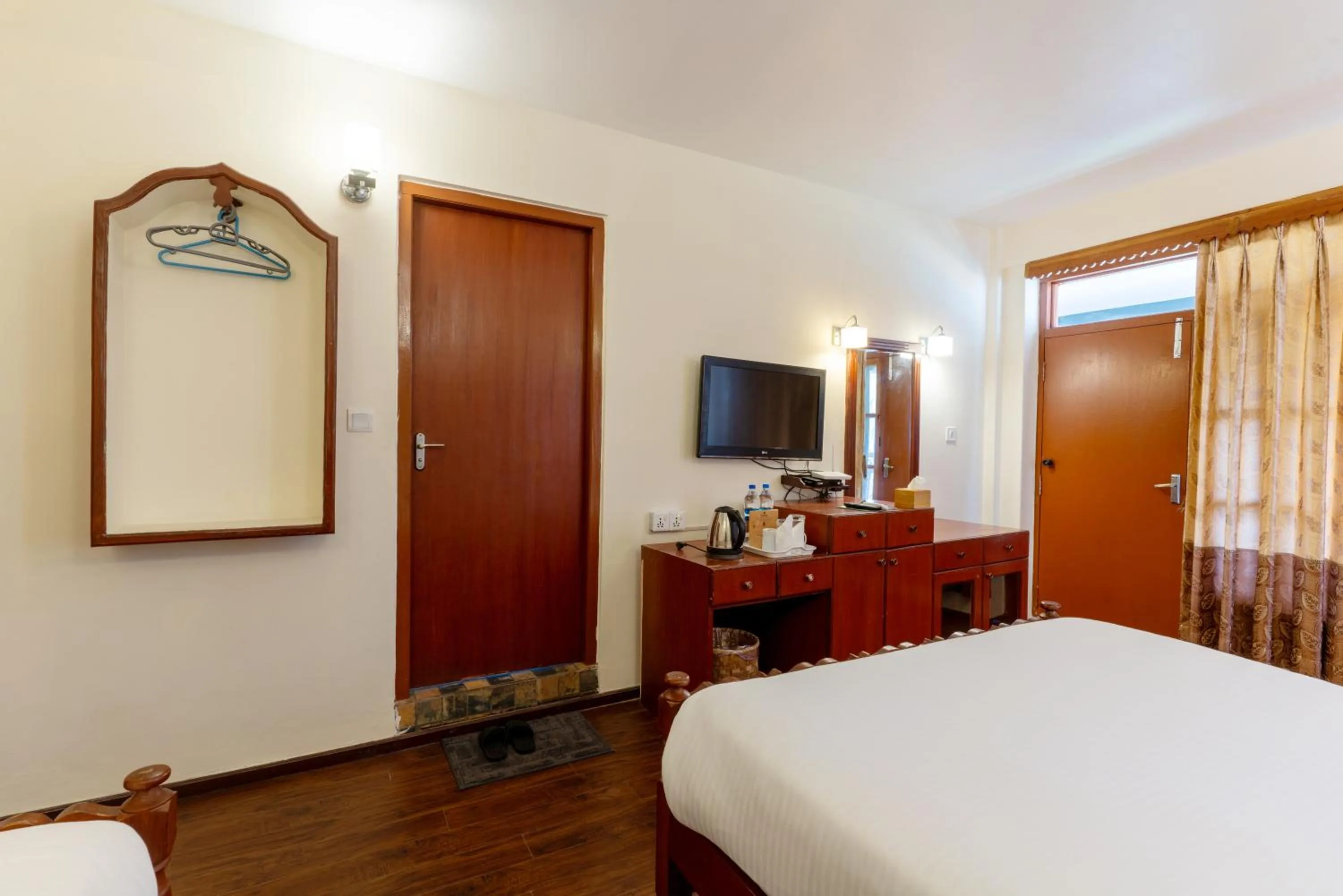 Bed in Lake View Resort