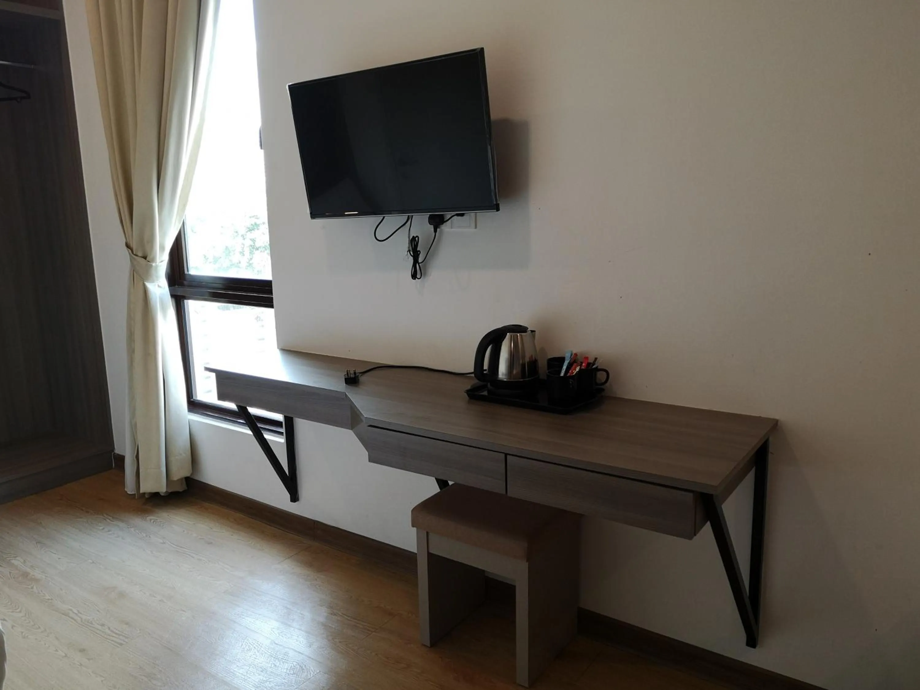 Seating area in Signature International Hotel China Town