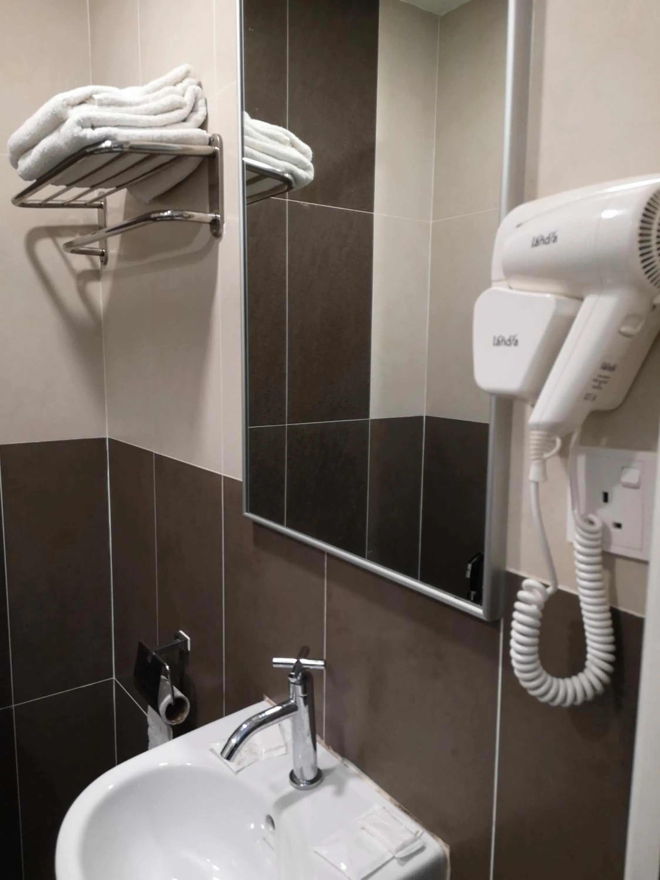 Bathroom in Signature International Hotel China Town