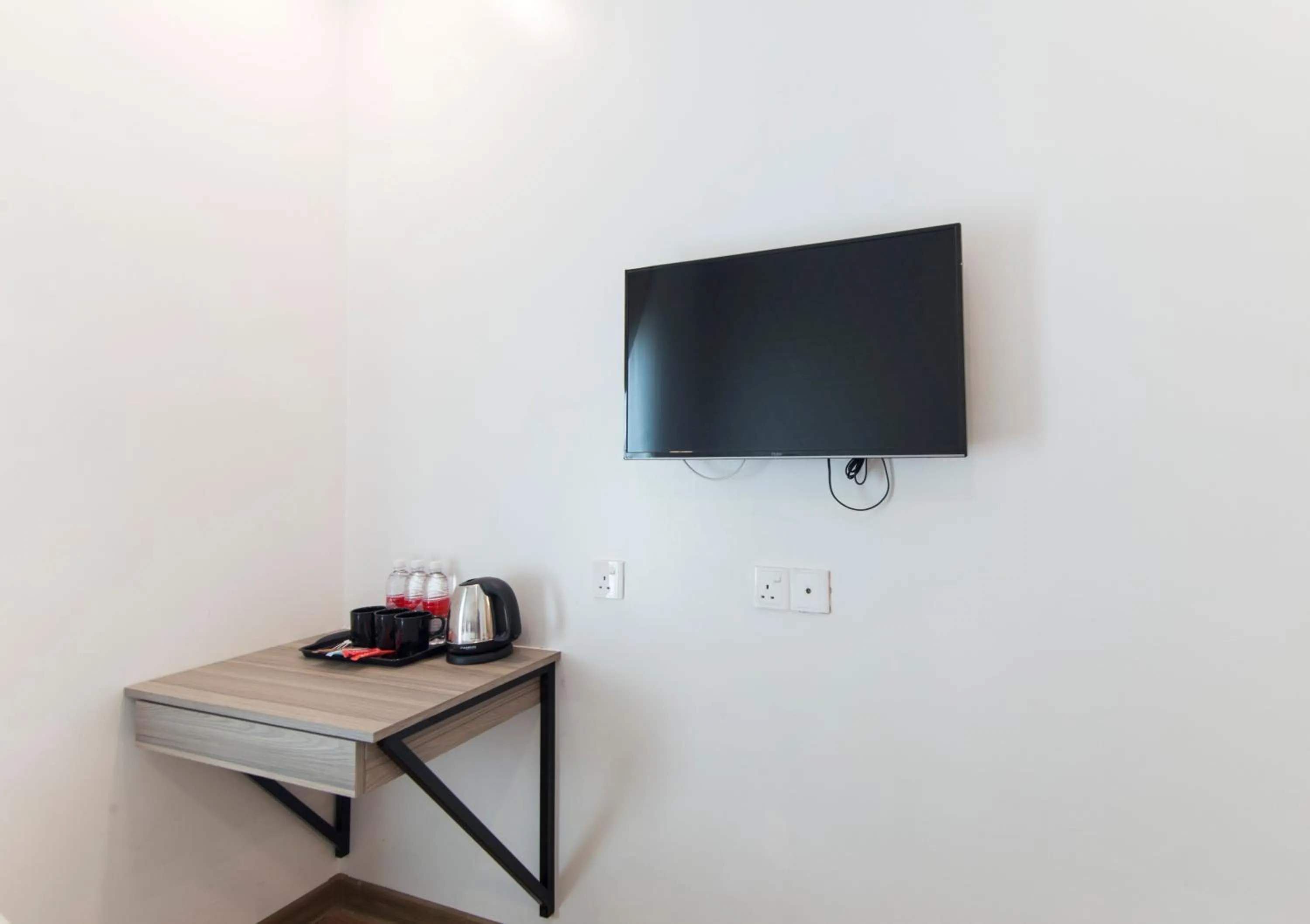 TV and multimedia in Signature International Hotel China Town