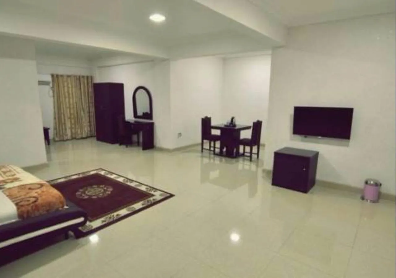 Bed in Tahir Guest Palace