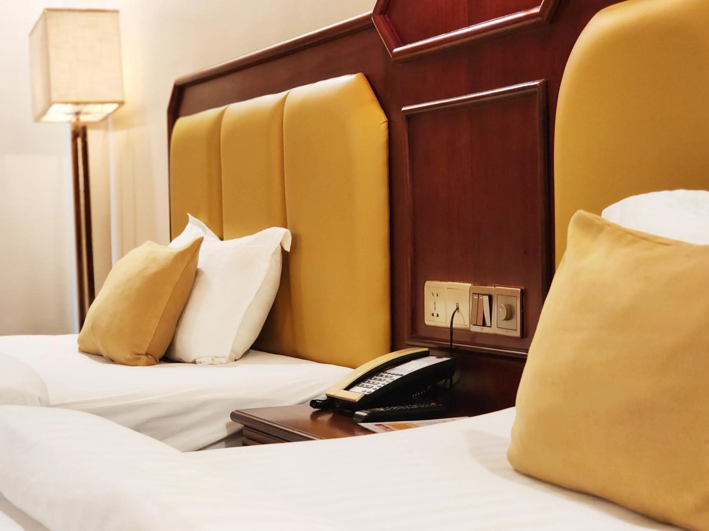 Bed in Lbn Asian Hotel