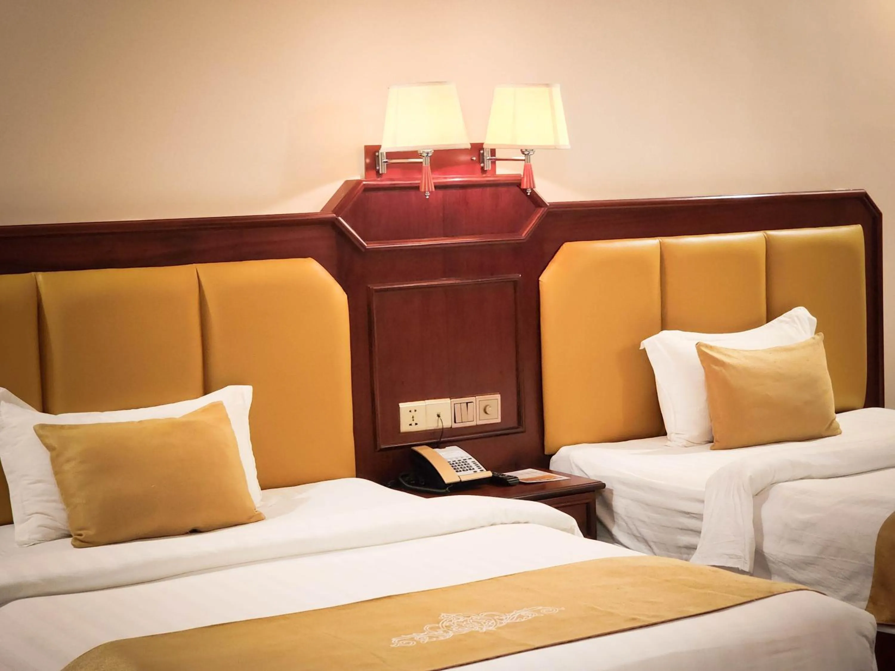 Bed in Lbn Asian Hotel