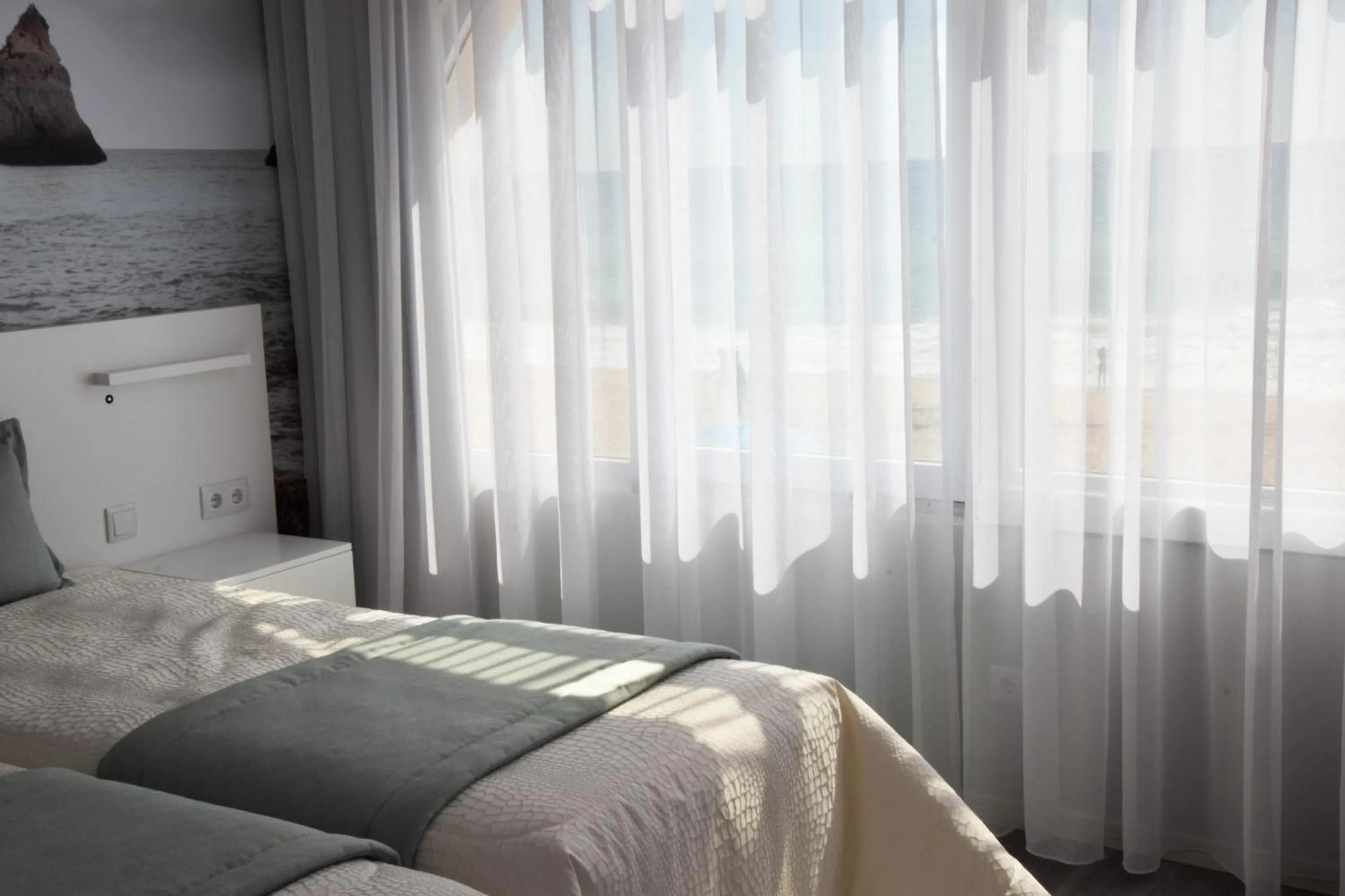 Bed in Golden Beach Guest House & Rooftop Bar