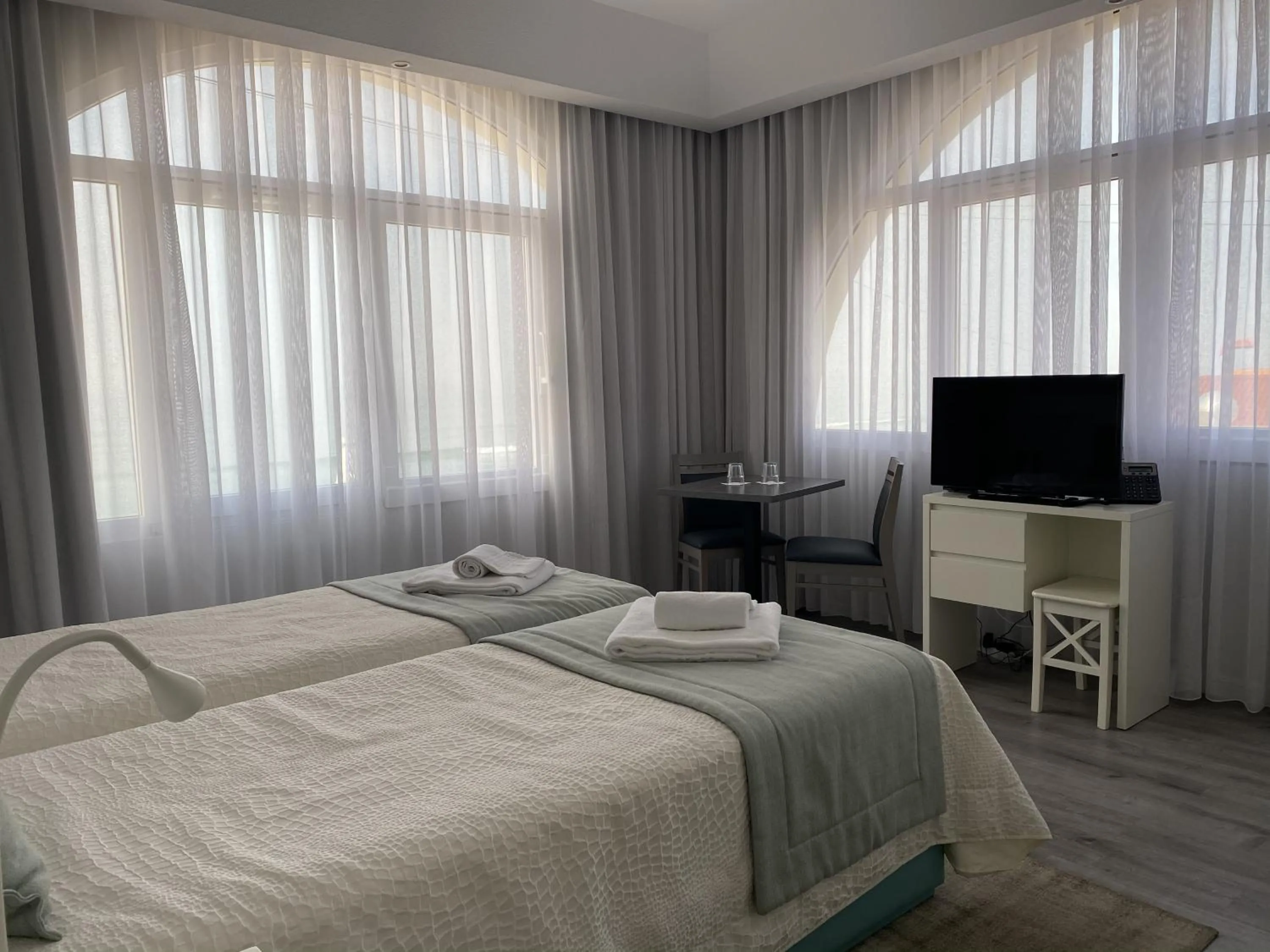 Bed in Golden Beach Guest House & Rooftop Bar