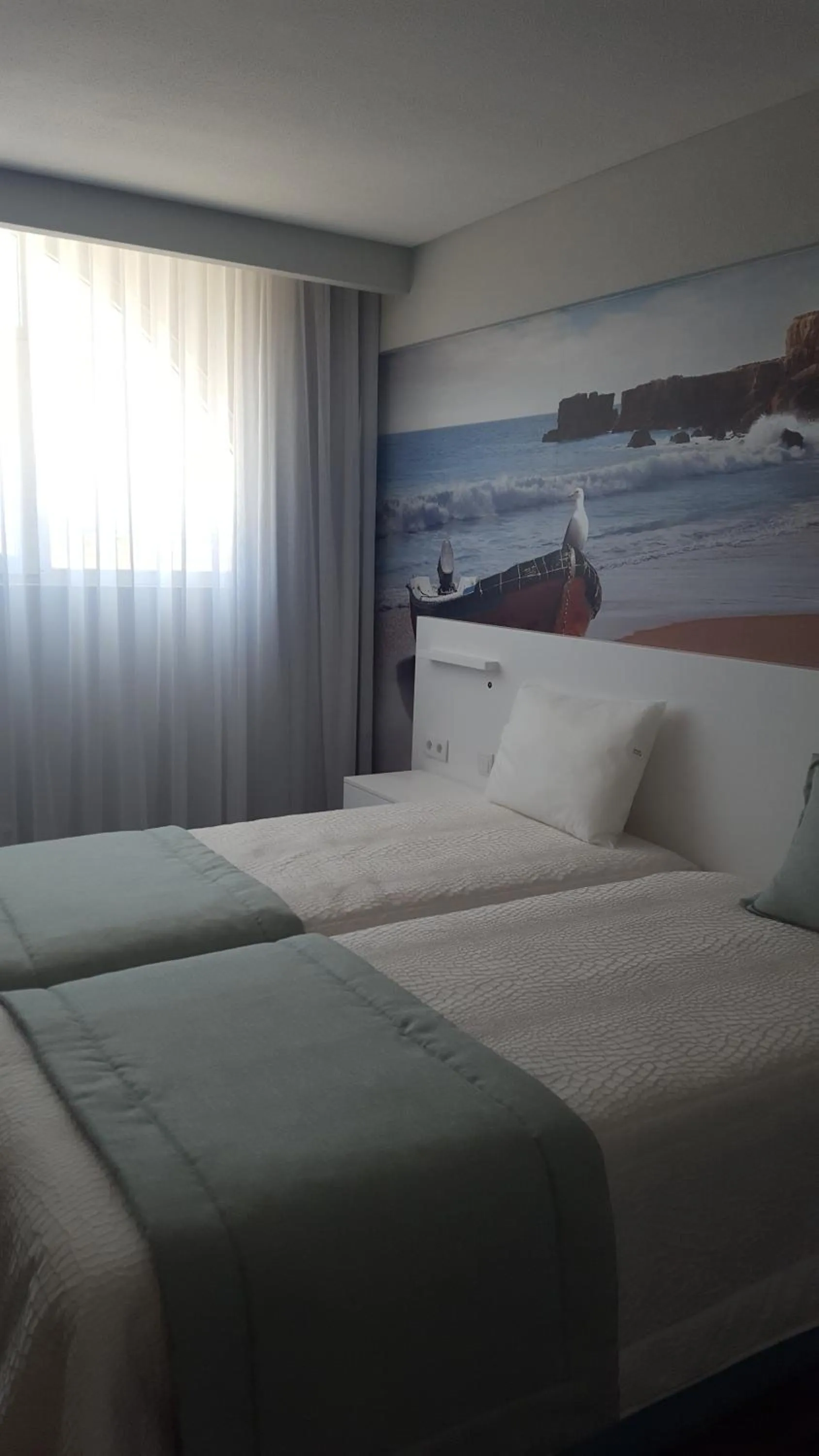 Bed in Golden Beach Guest House & Rooftop Bar