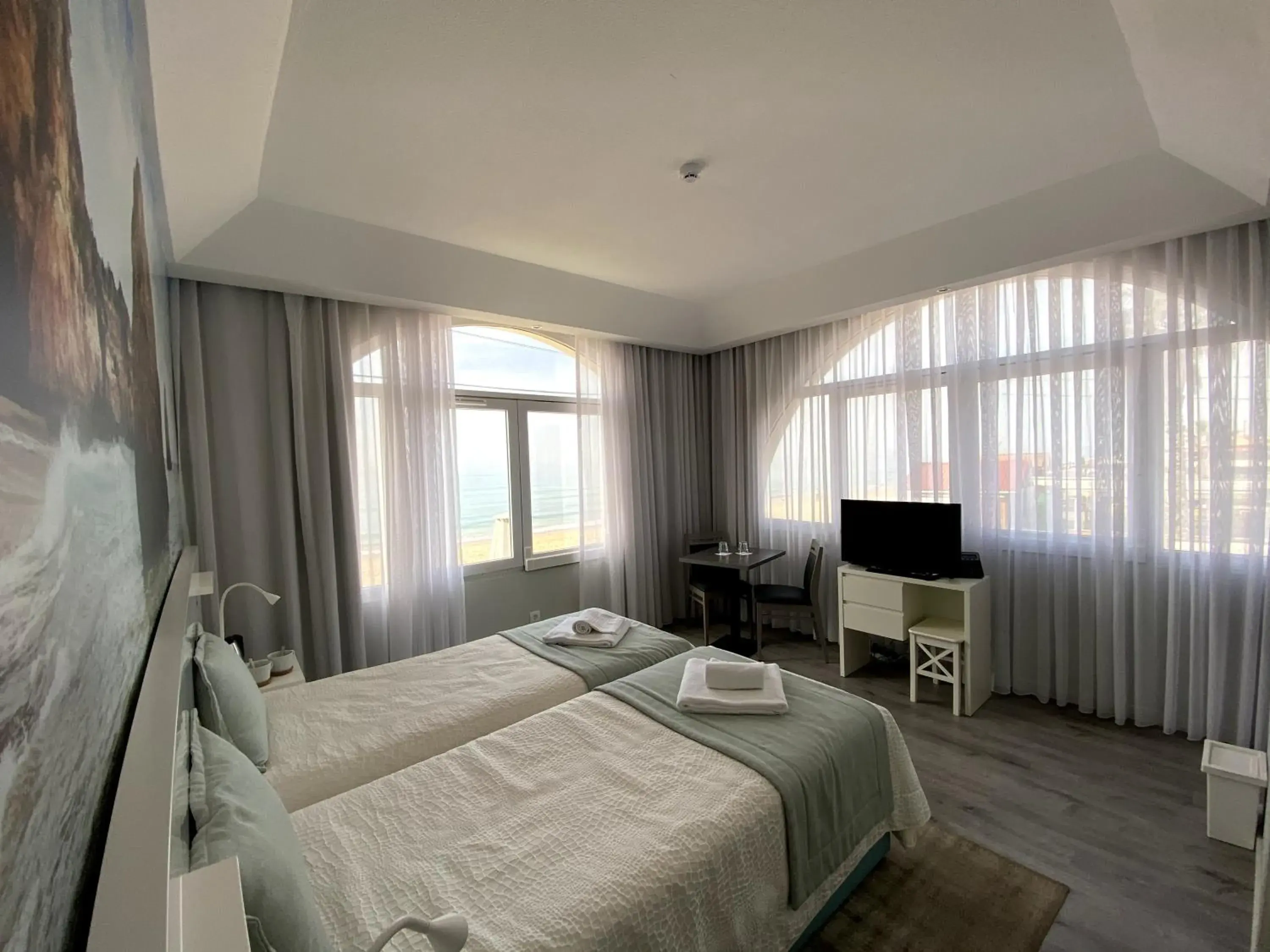 Premium Twin Room with Sea View in Golden Beach Guest House & Rooftop Bar Premium Twin Room with Sea View in Golden Beach Guest House & Rooftop Bar