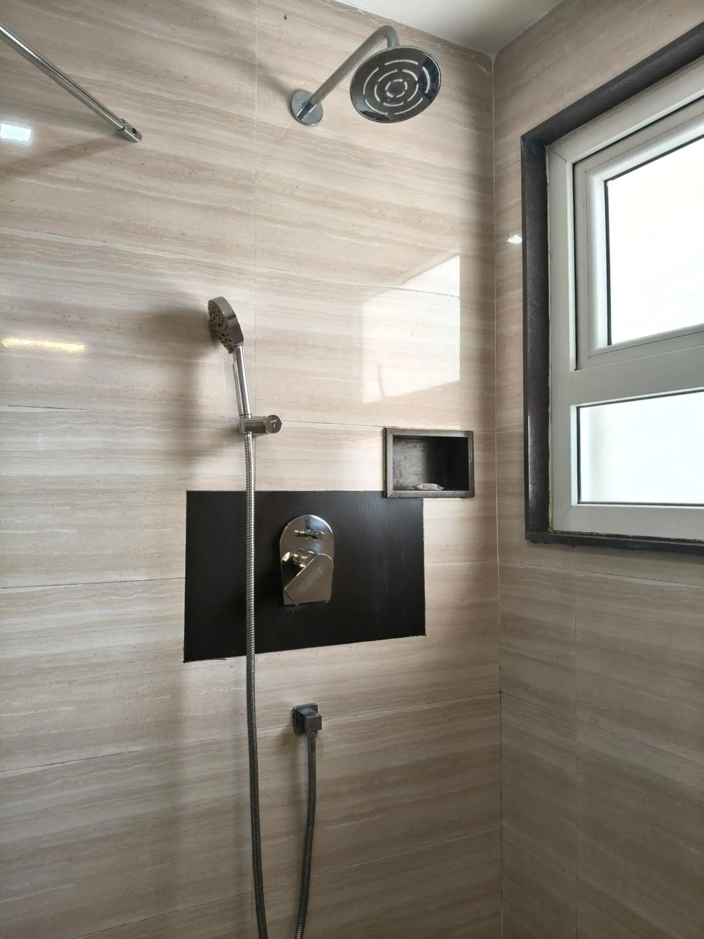Shower in Holiday Residency Coimbatore Shower in Holiday Residency Coimbatore