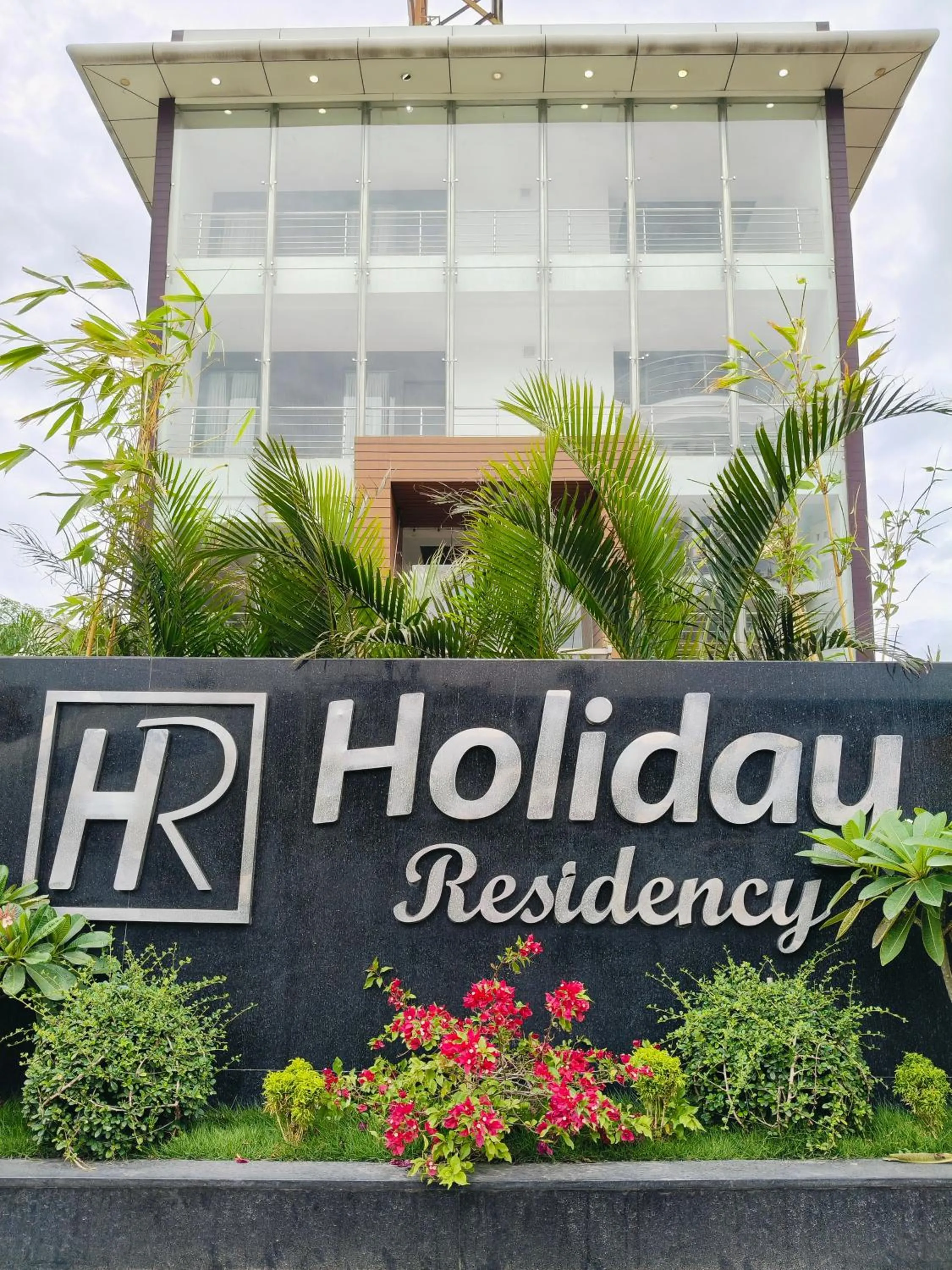 Property logo or sign in Holiday Residency Coimbatore