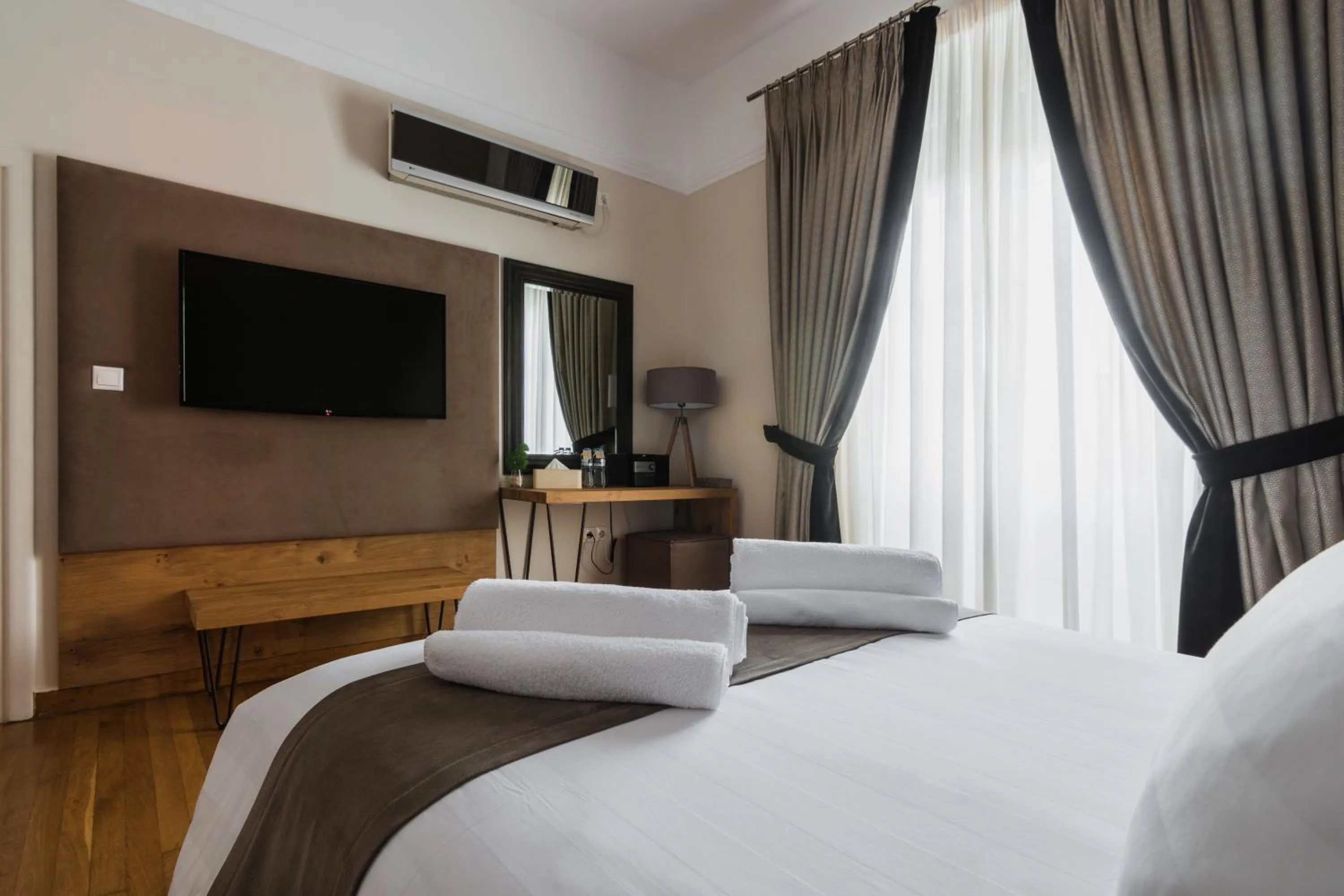 Bed in Acropolis Exclusive Residences