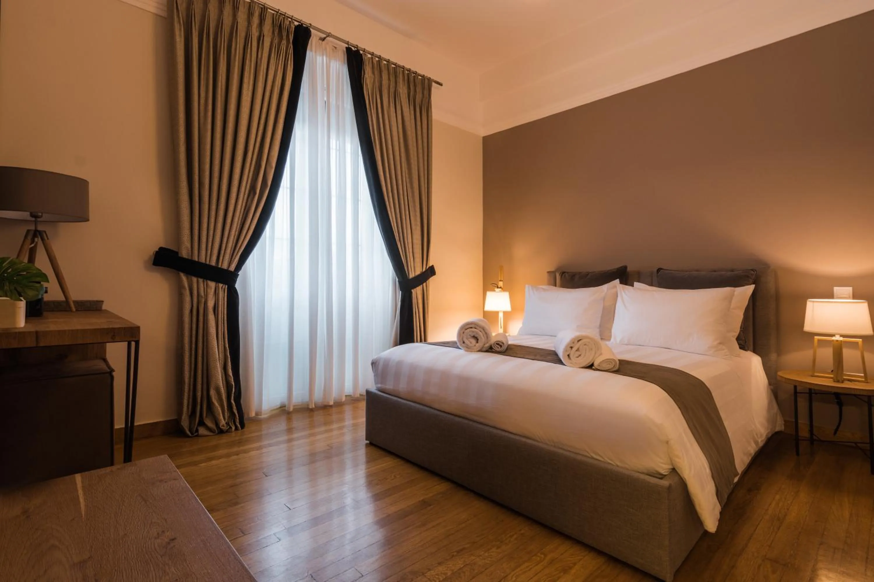 Bed in Acropolis Exclusive Residences