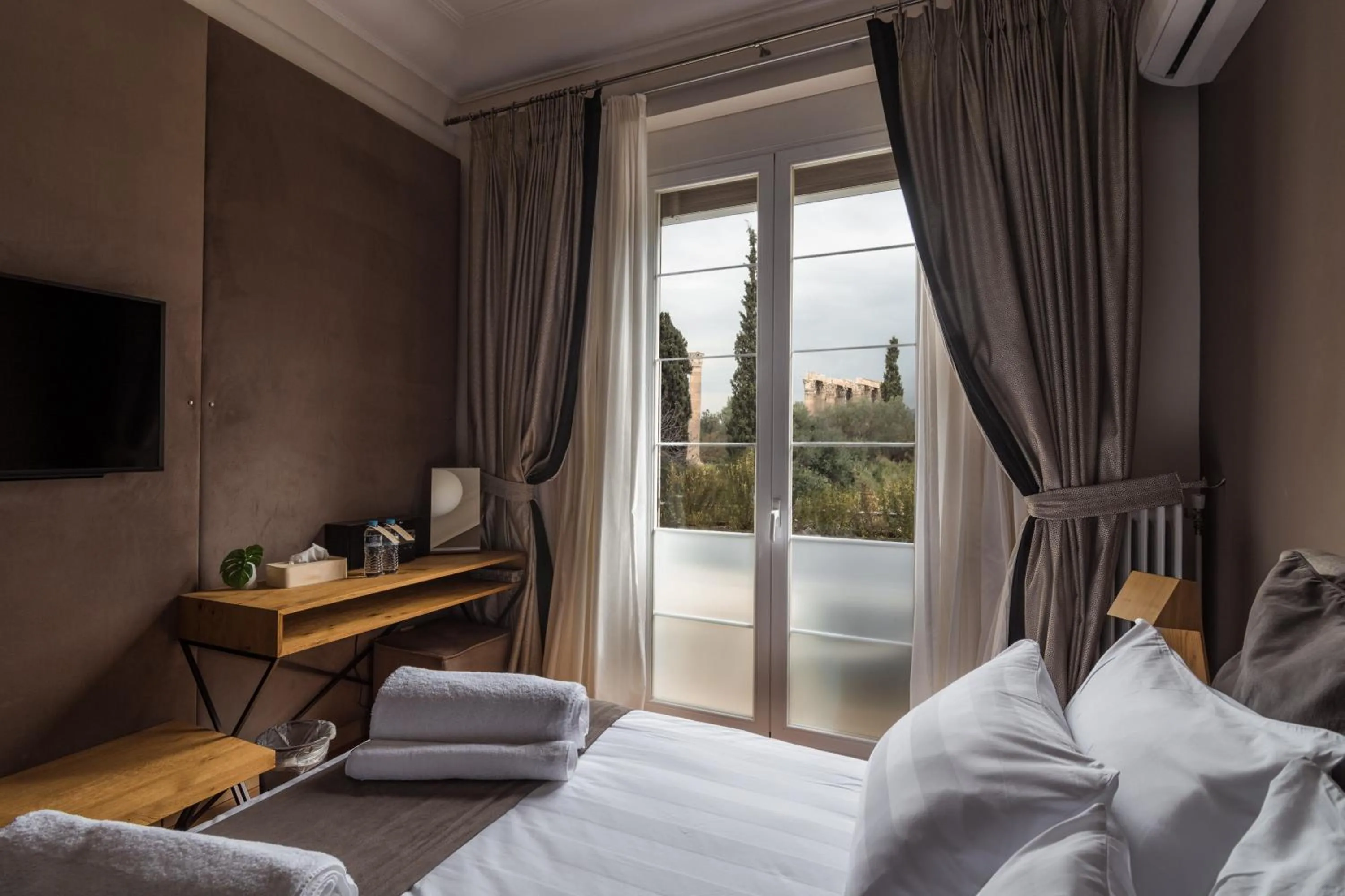 Bed in Acropolis Exclusive Residences