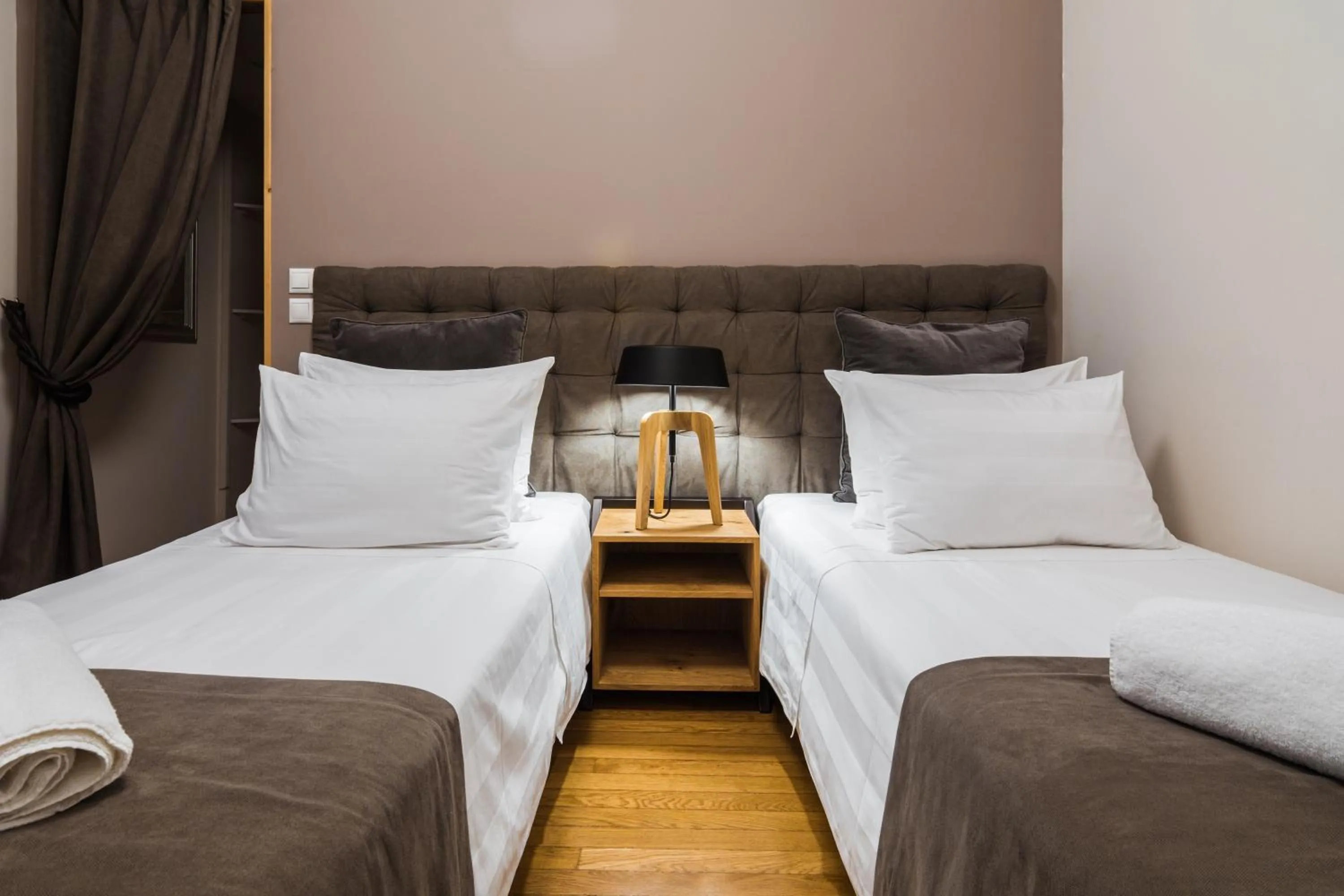 Bed in Acropolis Exclusive Residences