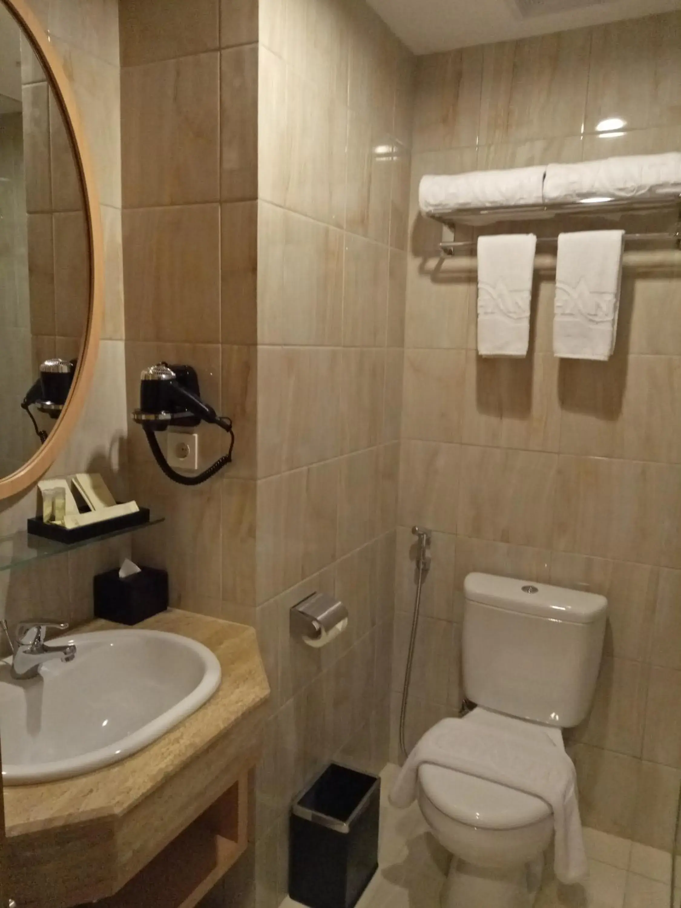 Bathroom in Hotel Chanti Managed by TENTREM Hotel Management Indonesia Bathroom in Hotel Chanti Managed by TENTREM Hotel Management Indonesia