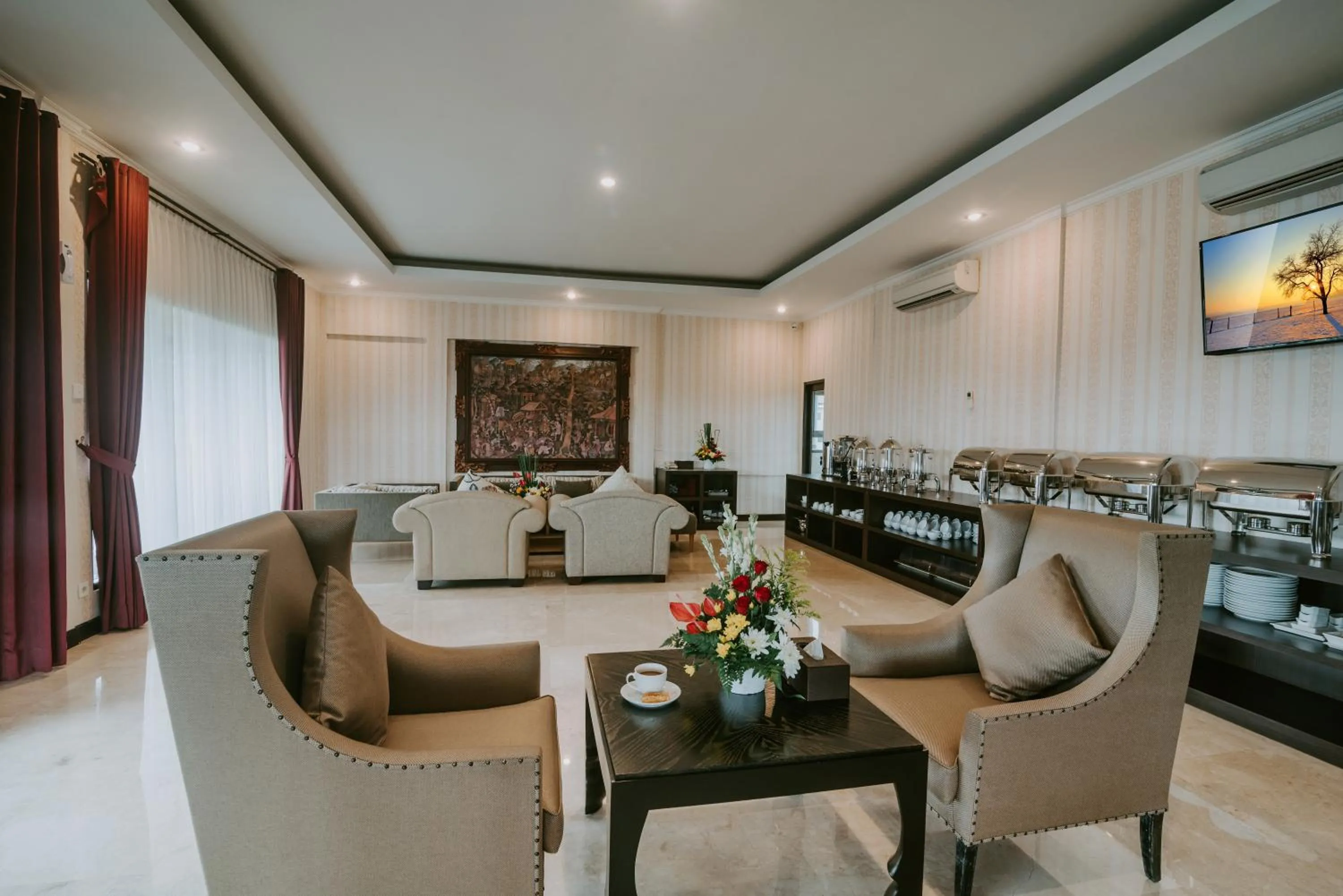 Communal lounge/ TV room in Arthur Suite by Premier HospitalityAsia