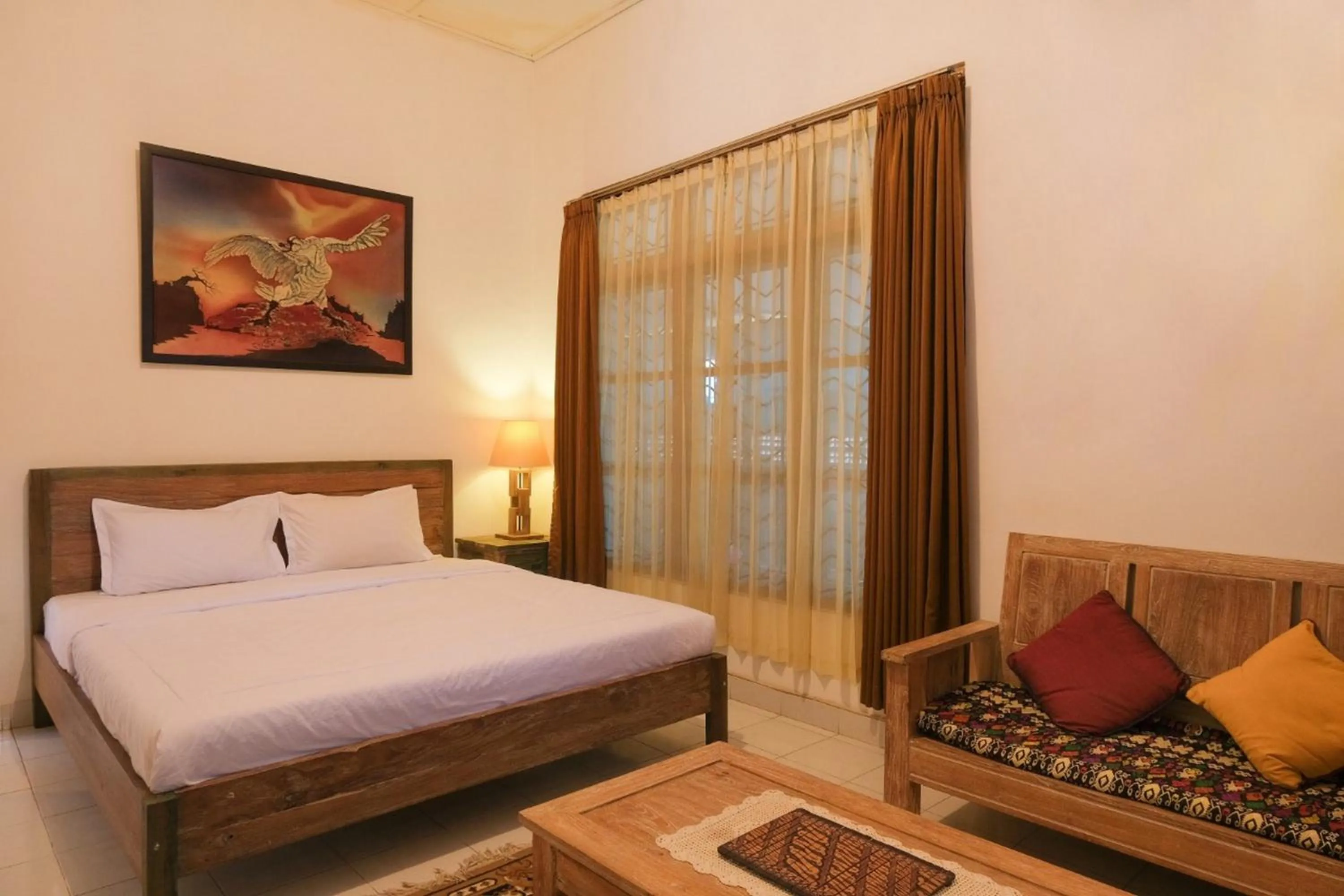 Bed in RedDoorz at Griya Cemara Homestay Yogyakarta