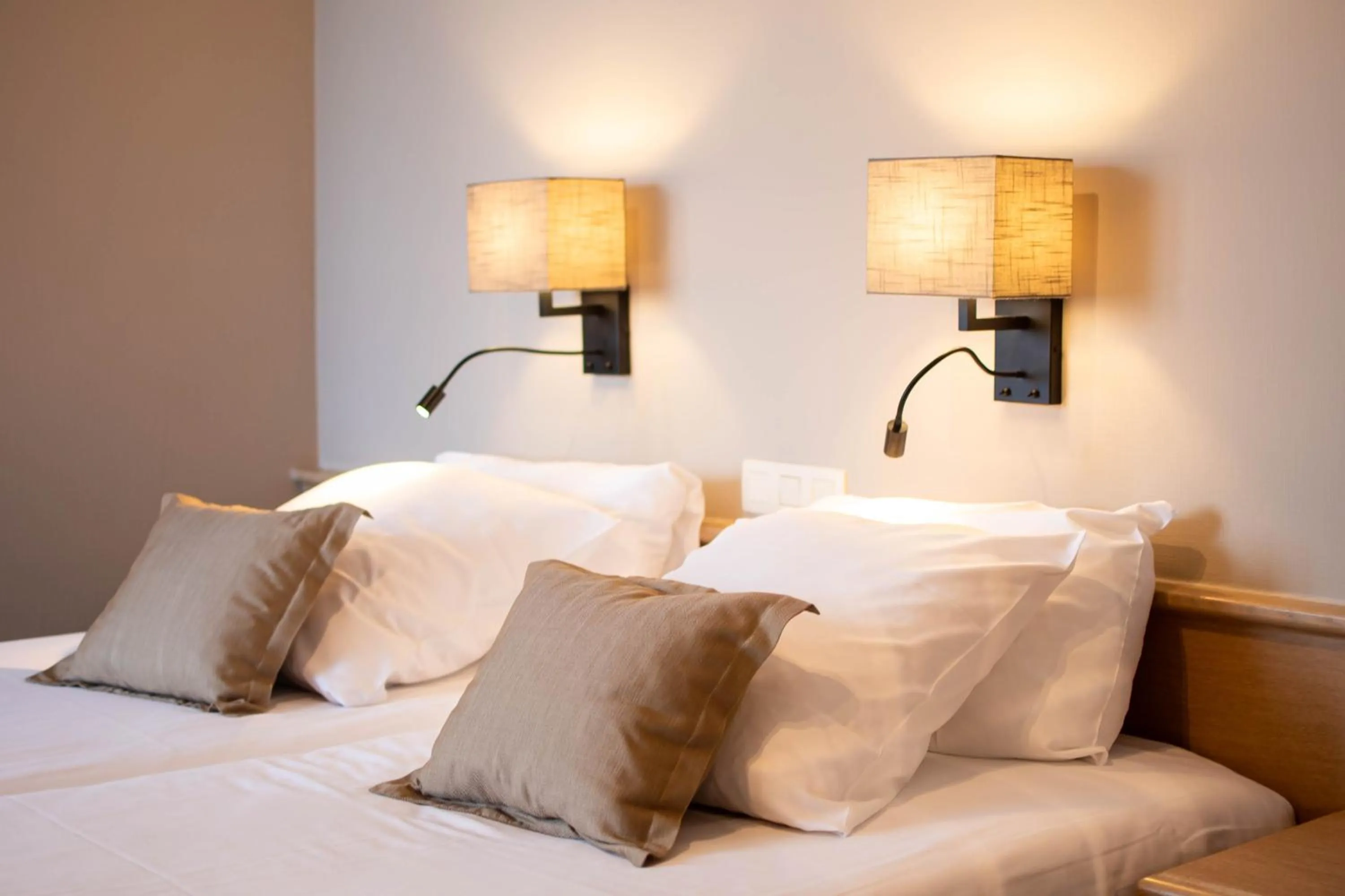 Bed in Ambassador Hotel