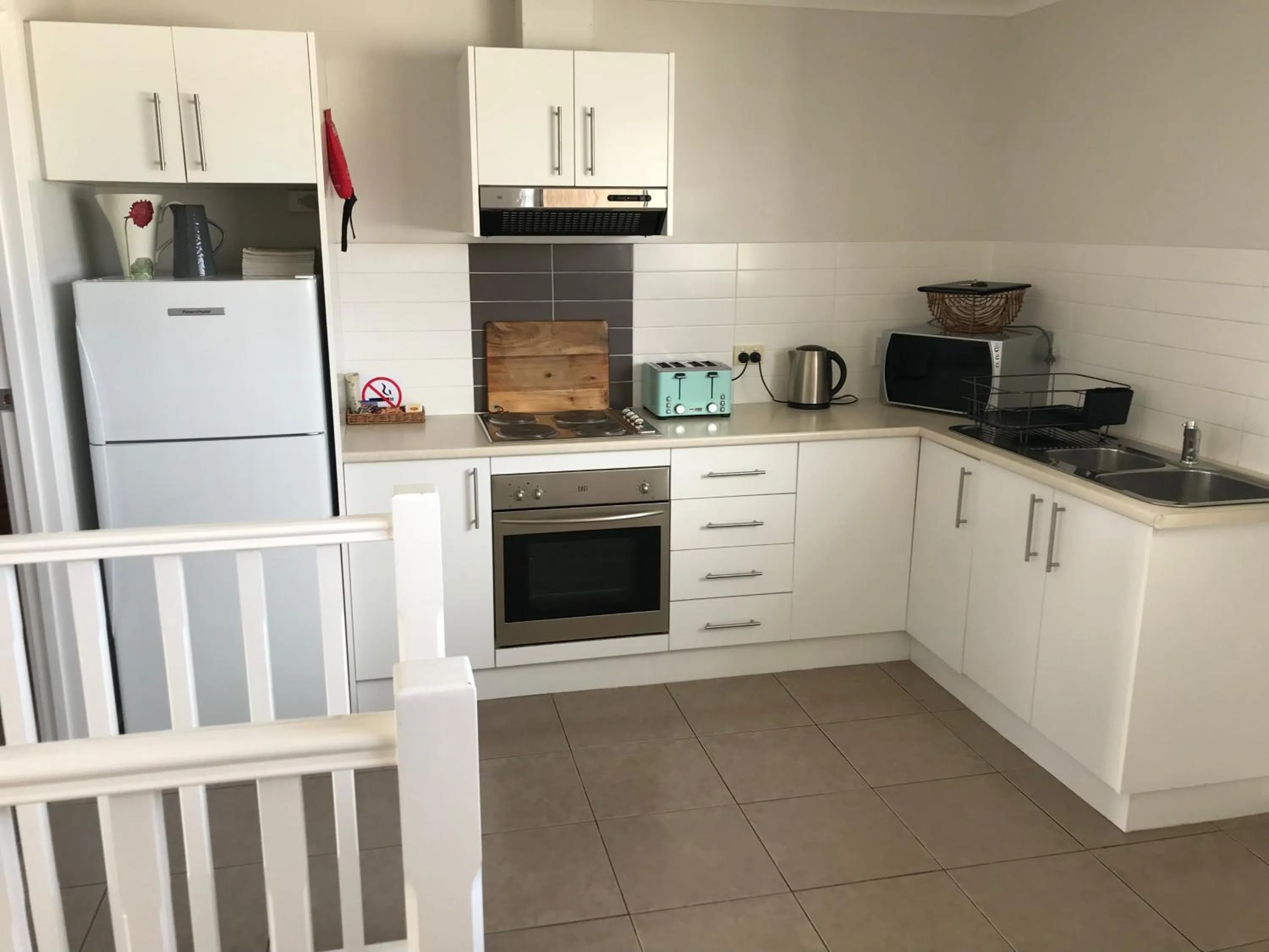 Kitchen or kitchenette in Inverloch Cabins & Apartments