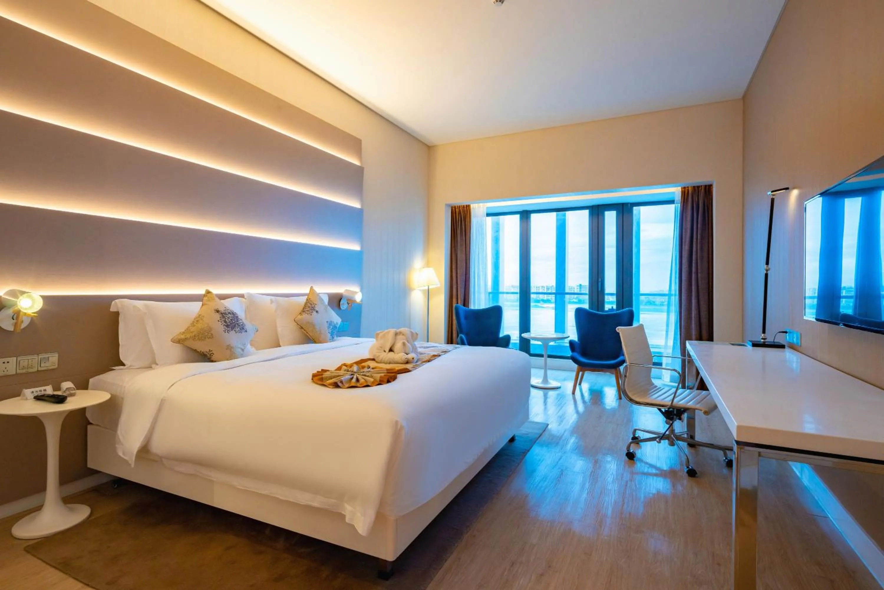 Bed in Sanya Phoenix Airport Hotel