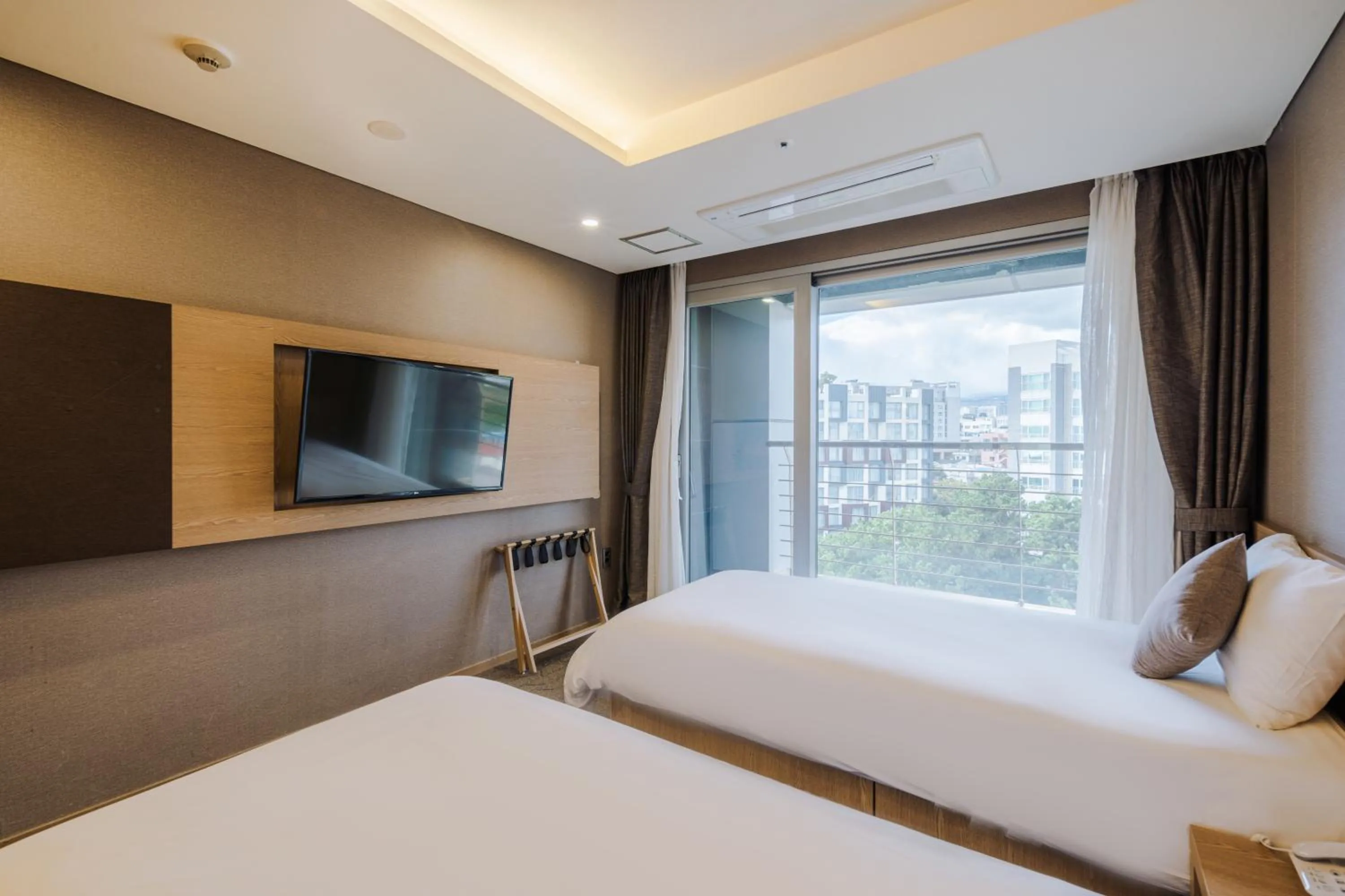 Bed in Hotel bridge Seogwipo