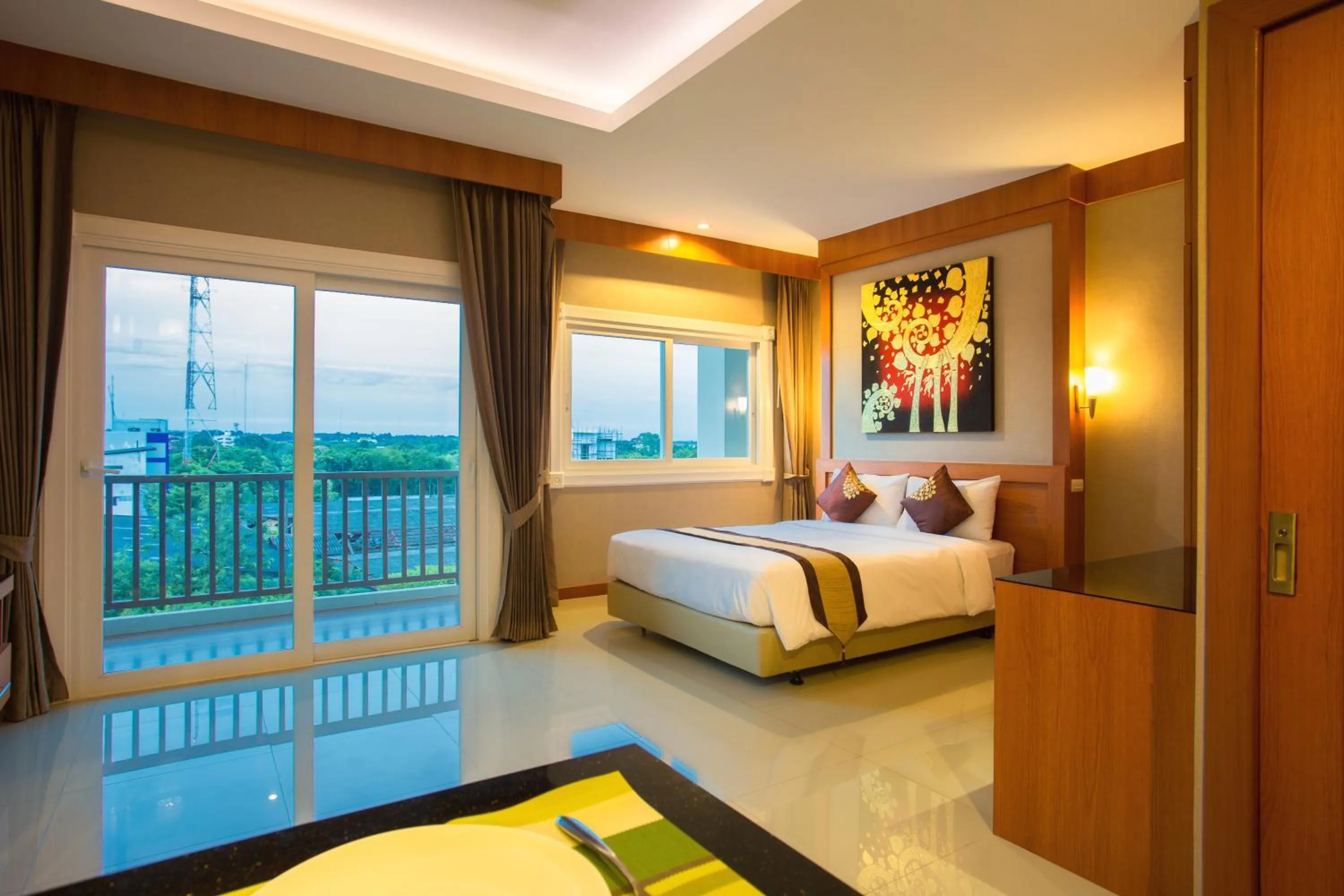 Bed in Romantic Khon Kaen Hotel