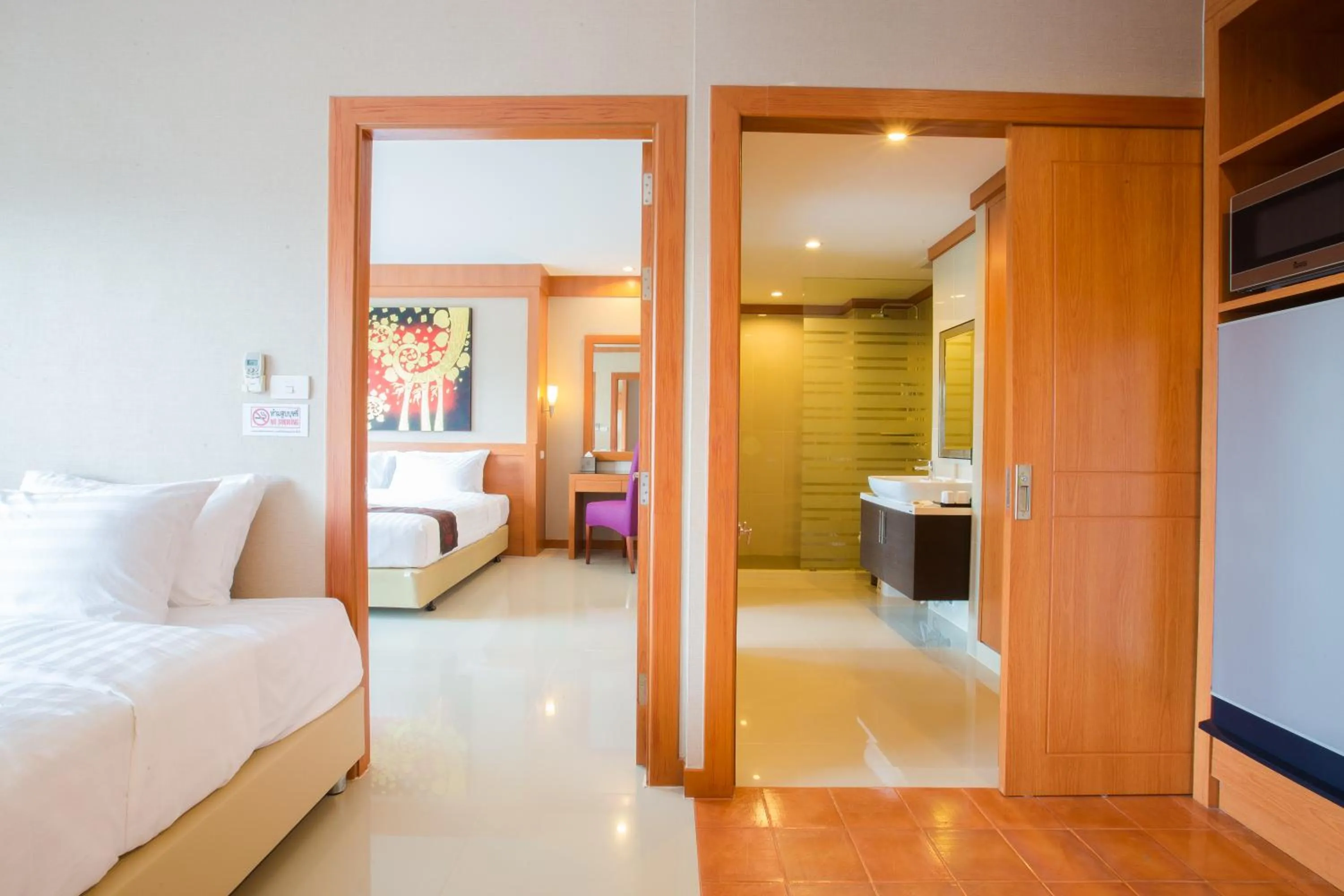 Bed in Romantic Khon Kaen Hotel