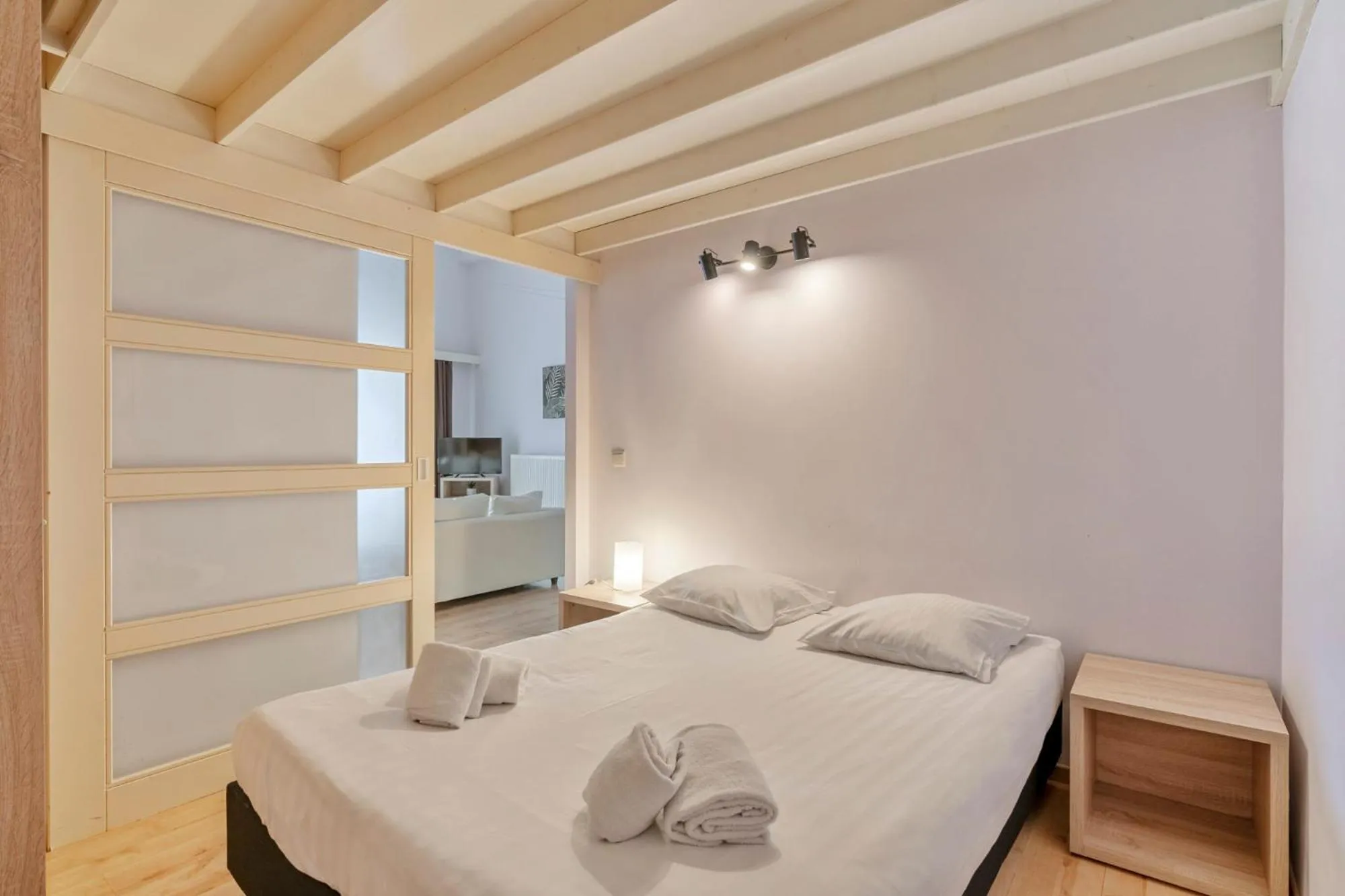 Bed in Ambassador Suites Leuven