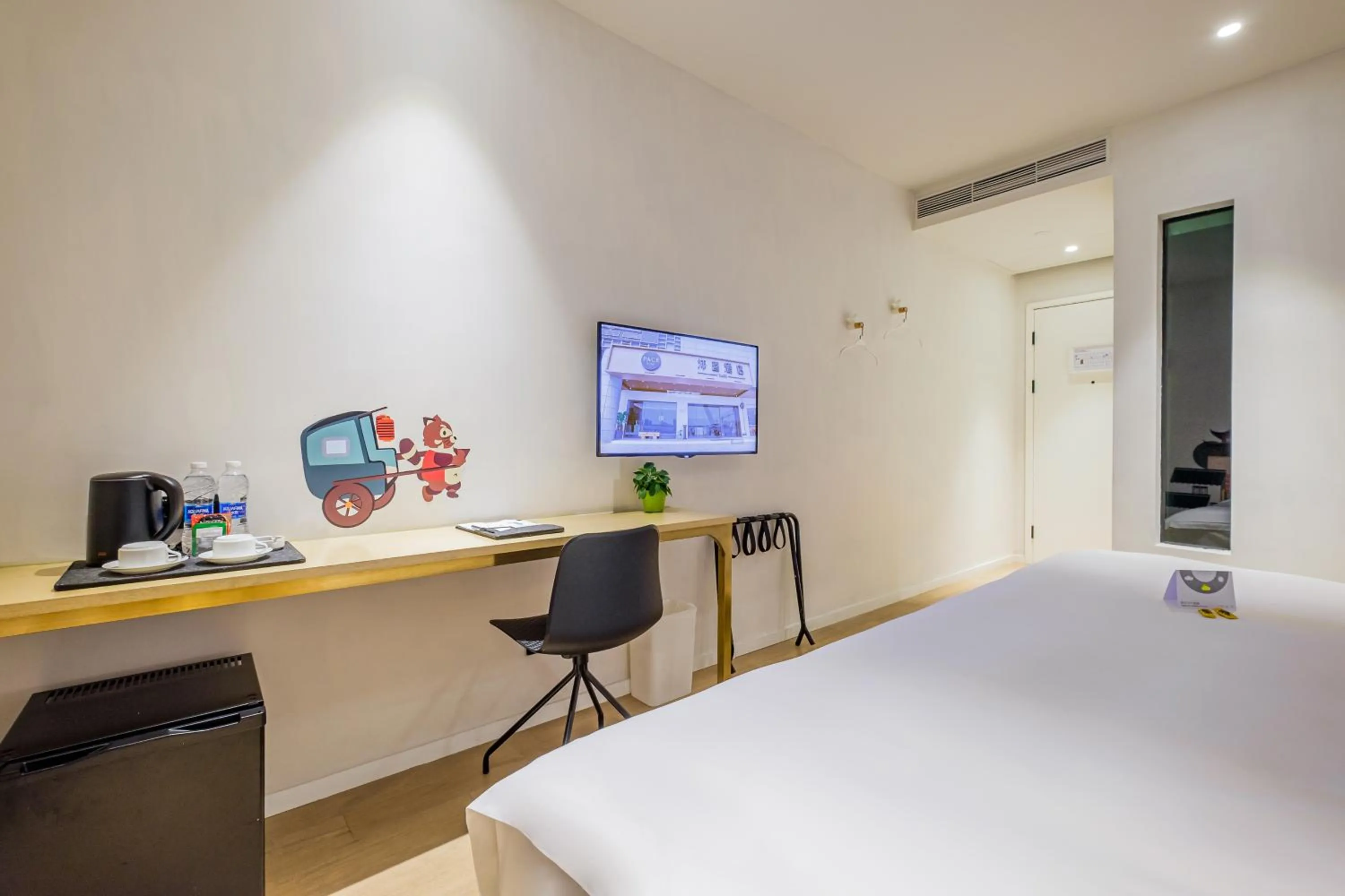 Bed in PACE HOTEL Suzhou Renmin Branch