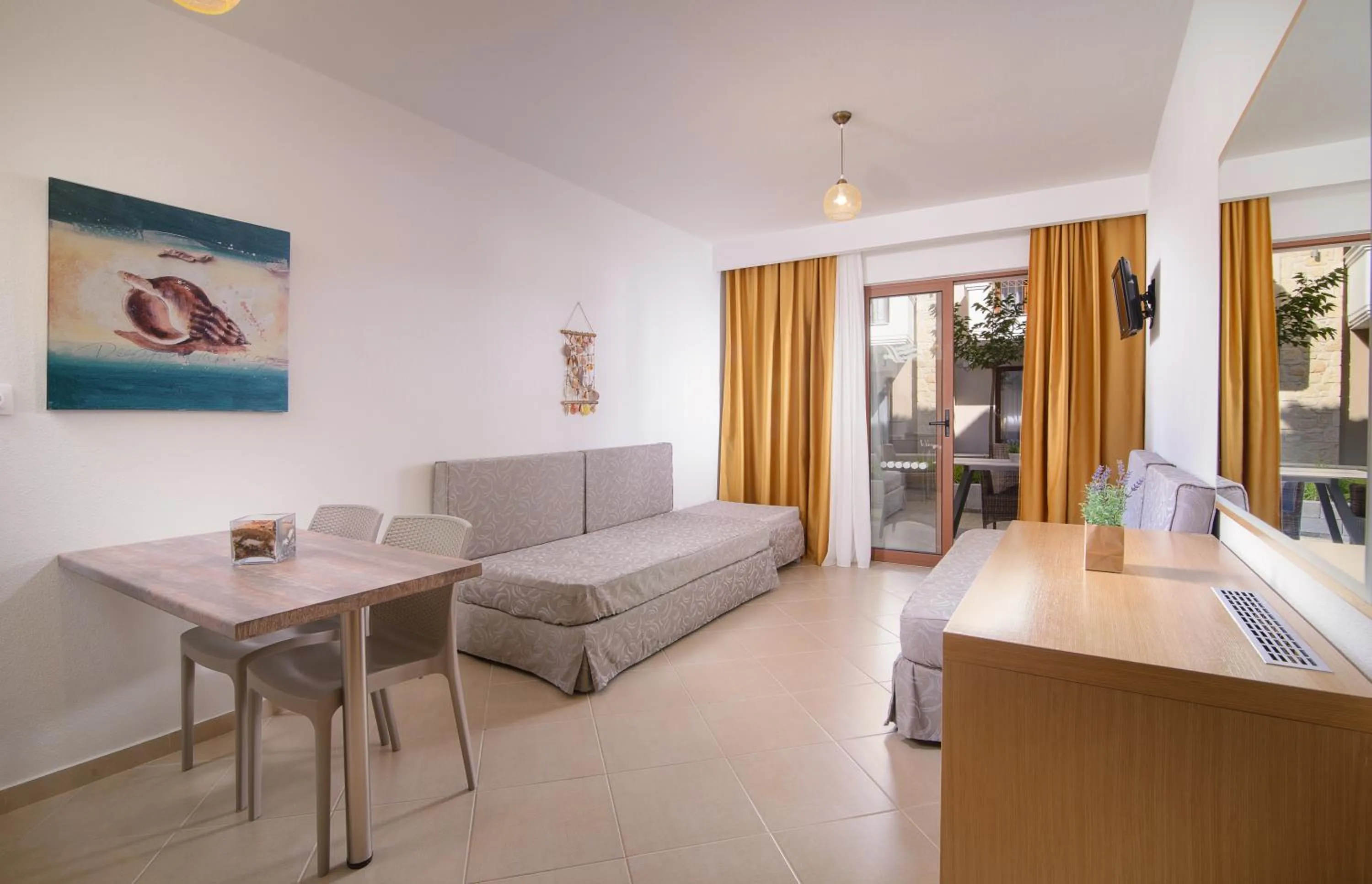 Living room in Apanemia by Flegra Hotels