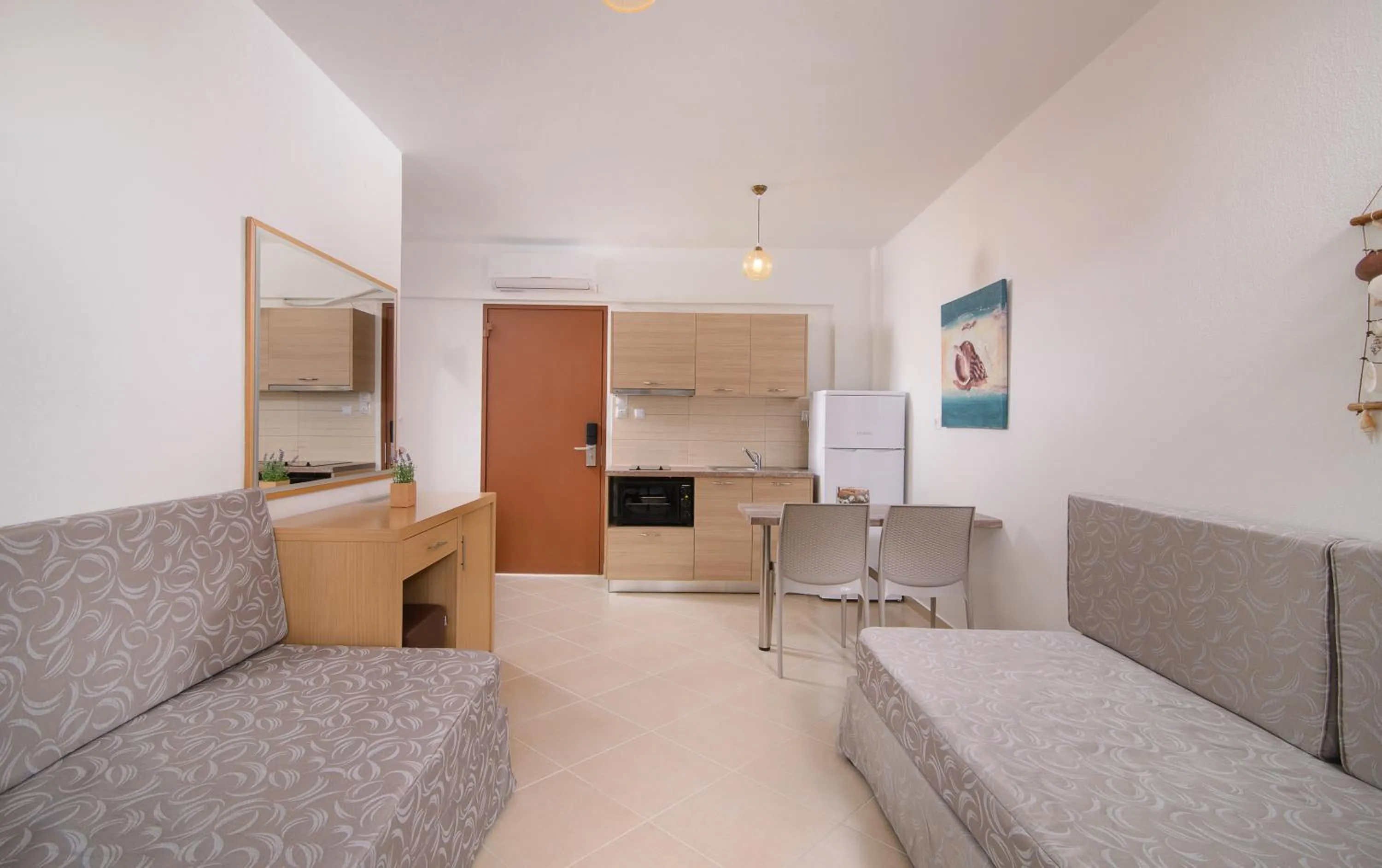 Living room in Apanemia by Flegra Hotels