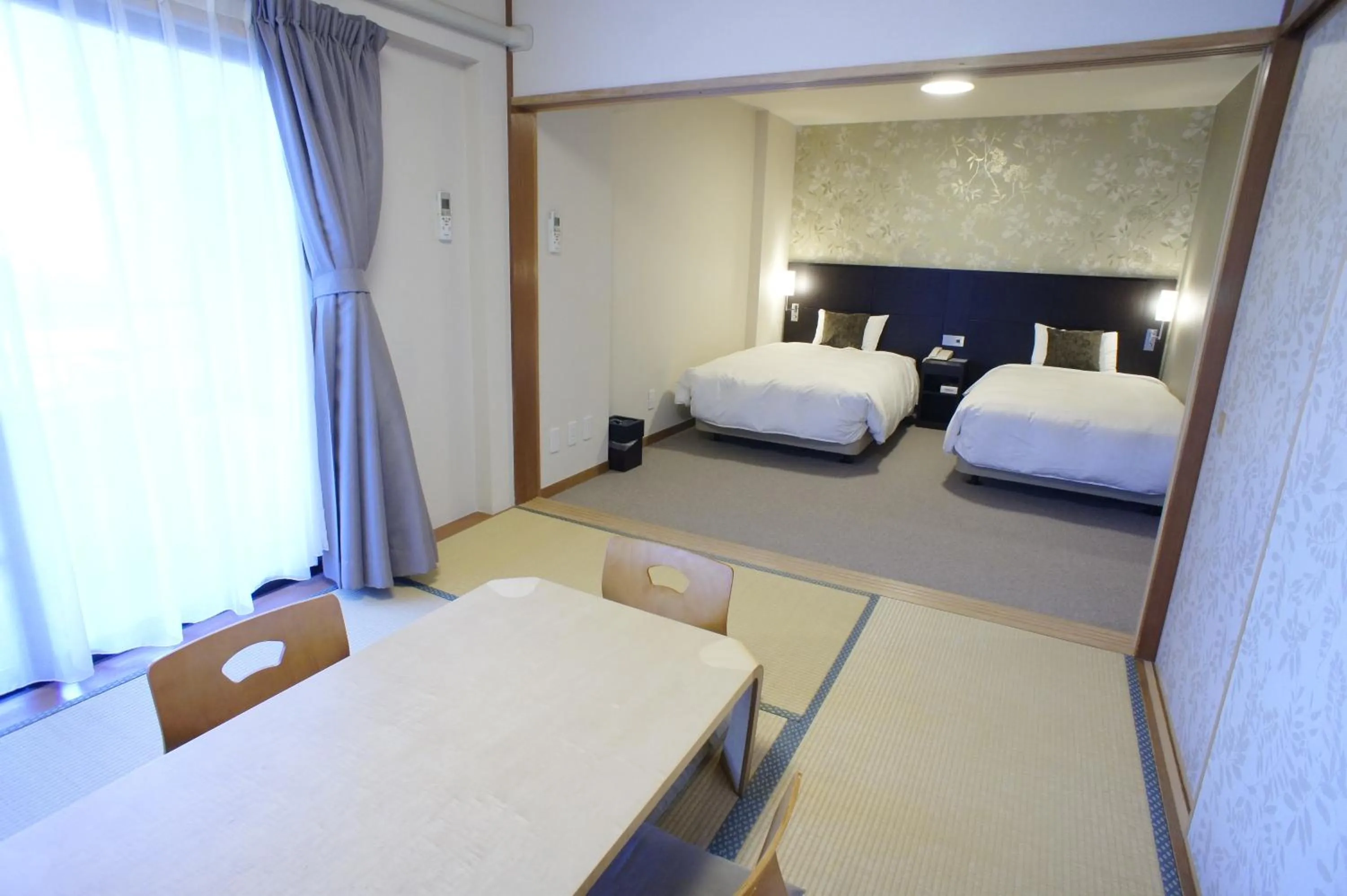 Photo of the whole room, Bed in Wisterian Life Club Verde no Mori