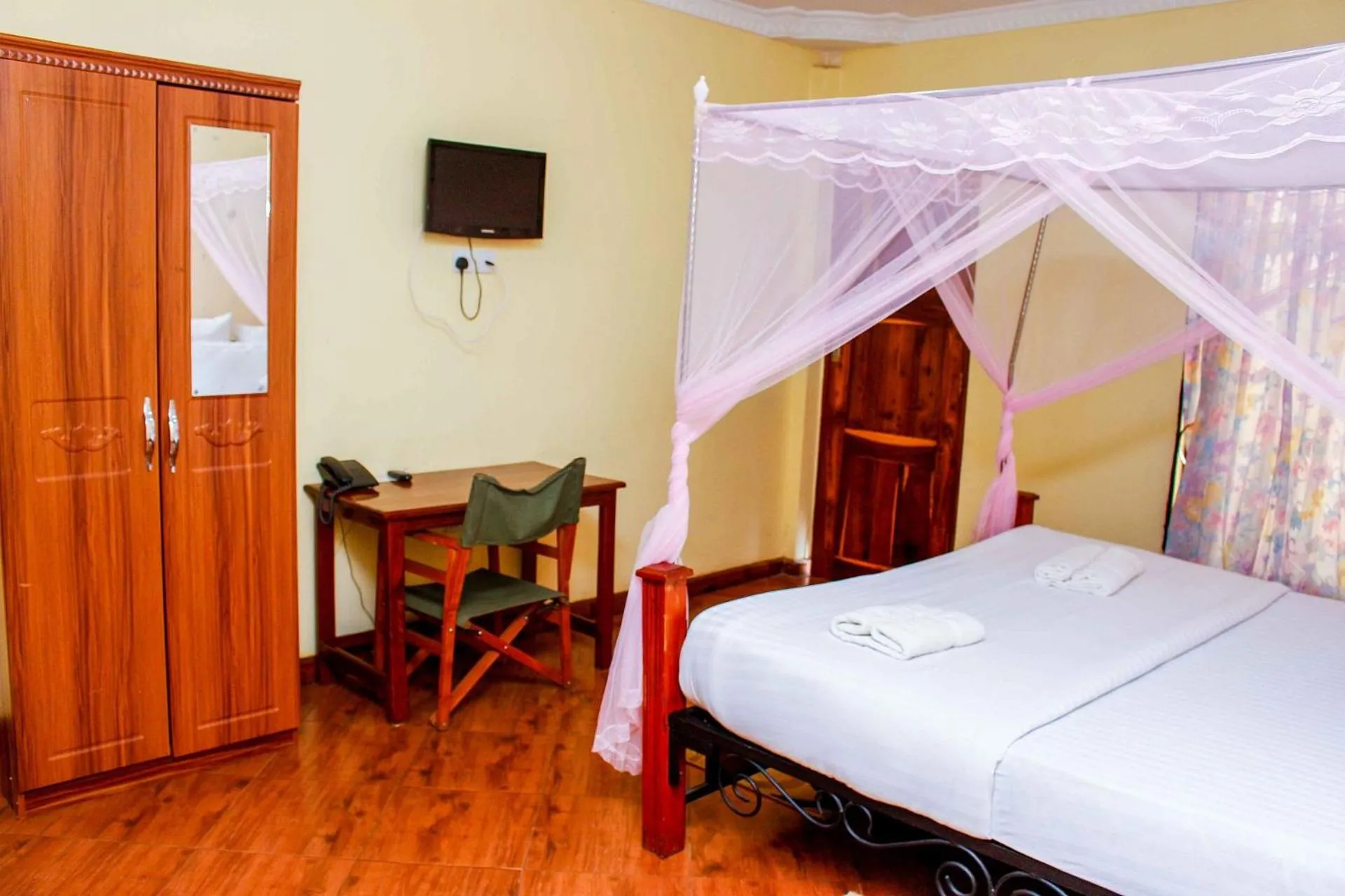 Bed in Bright Star Hotel & Safaris