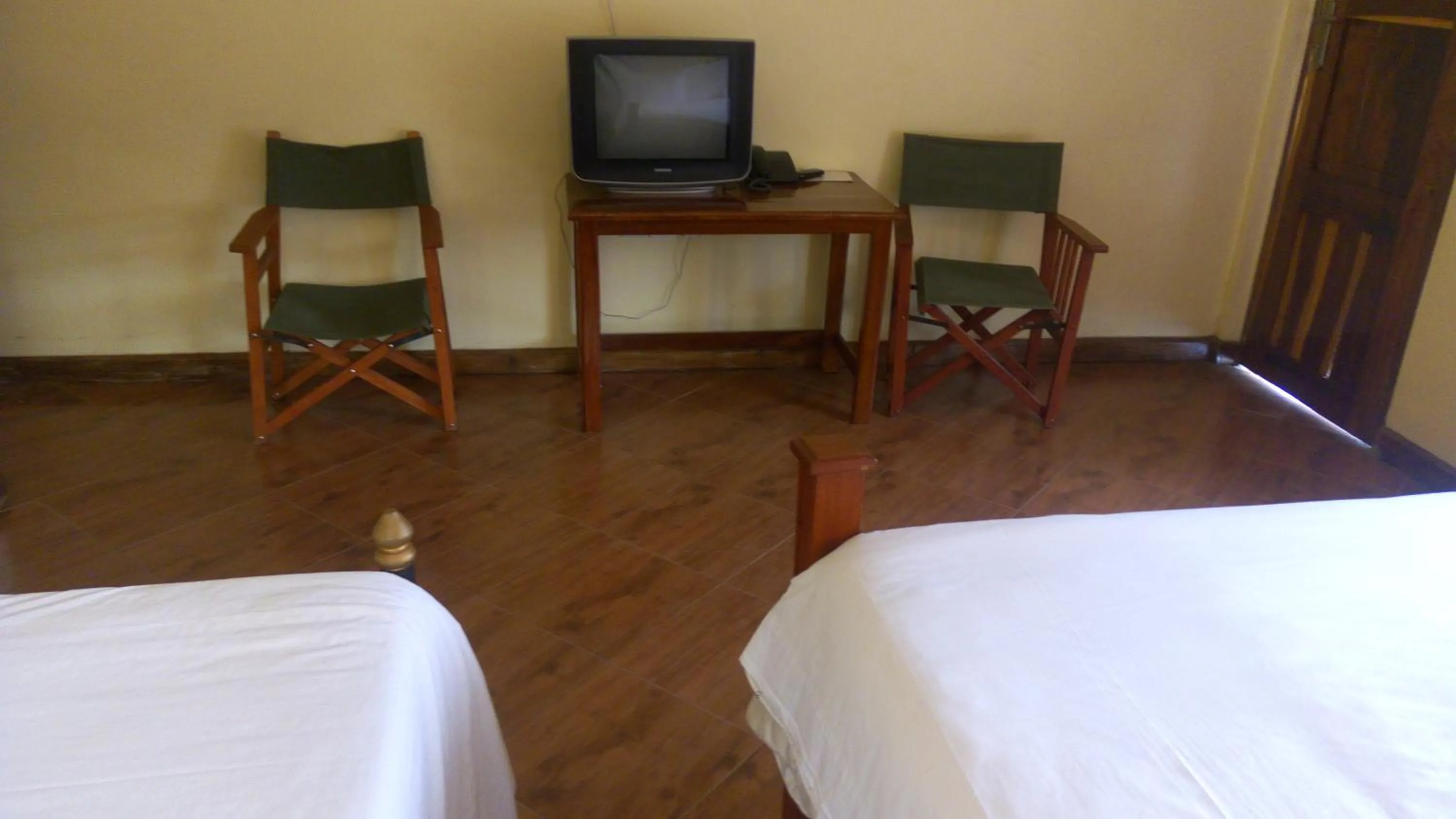 Photo of the whole room, Bed in Bright Star Hotel & Safaris