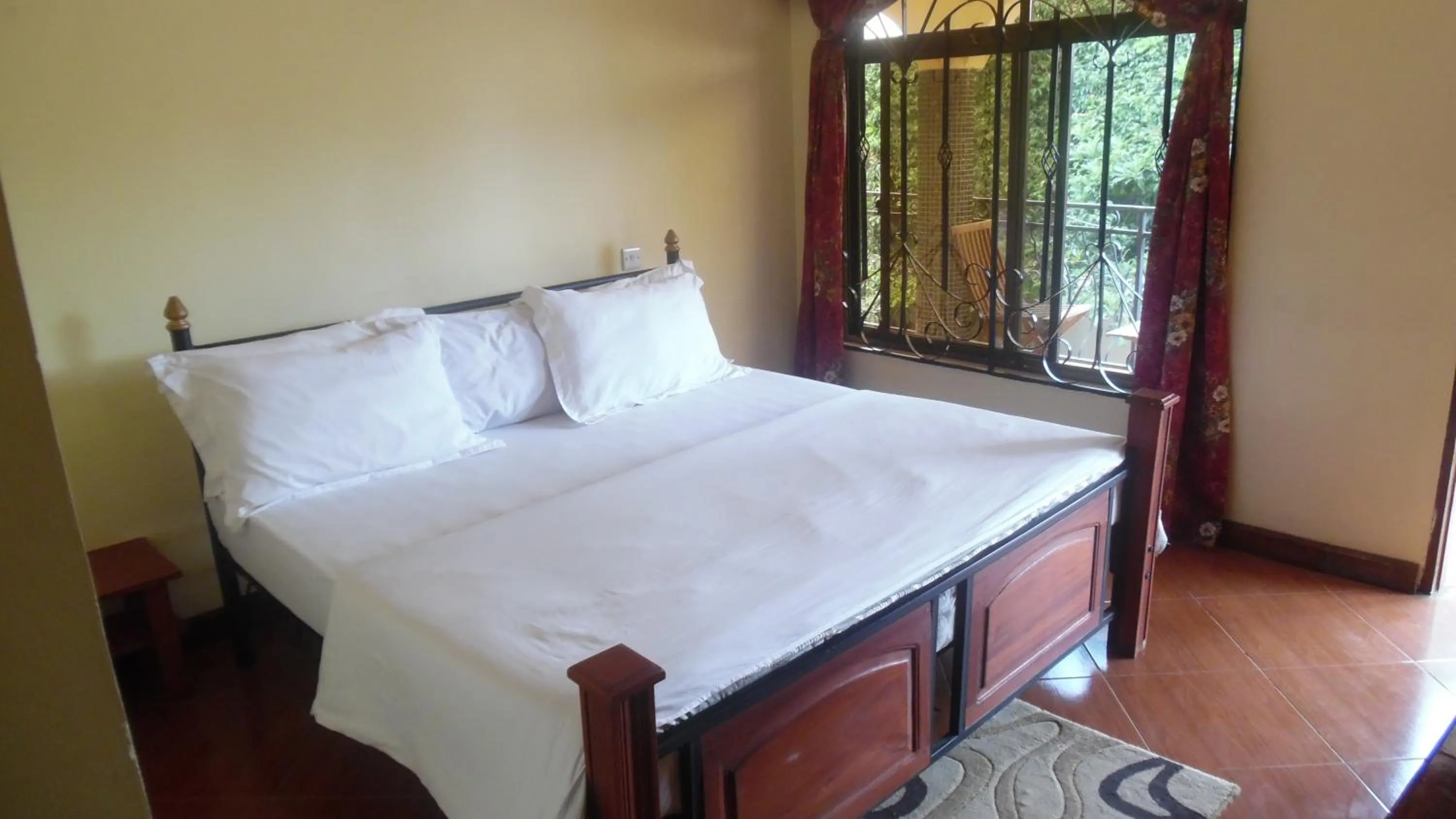 Bed in Bright Star Hotel & Safaris