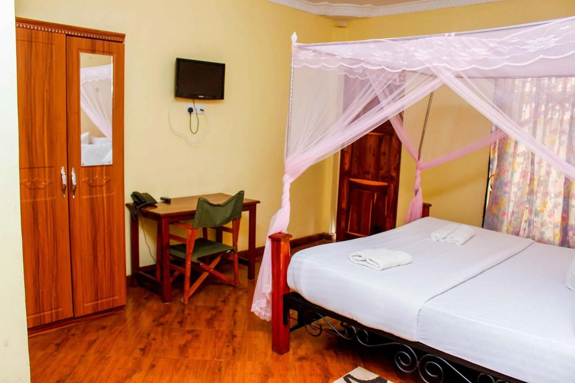 Photo of the whole room, Bed in Bright Star Hotel & Safaris