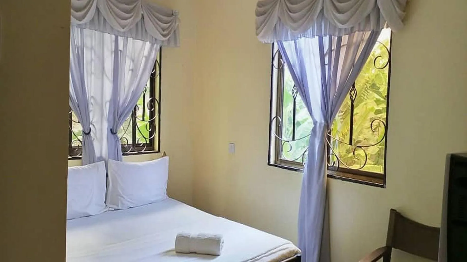 Bed in Bright Star Hotel & Safaris