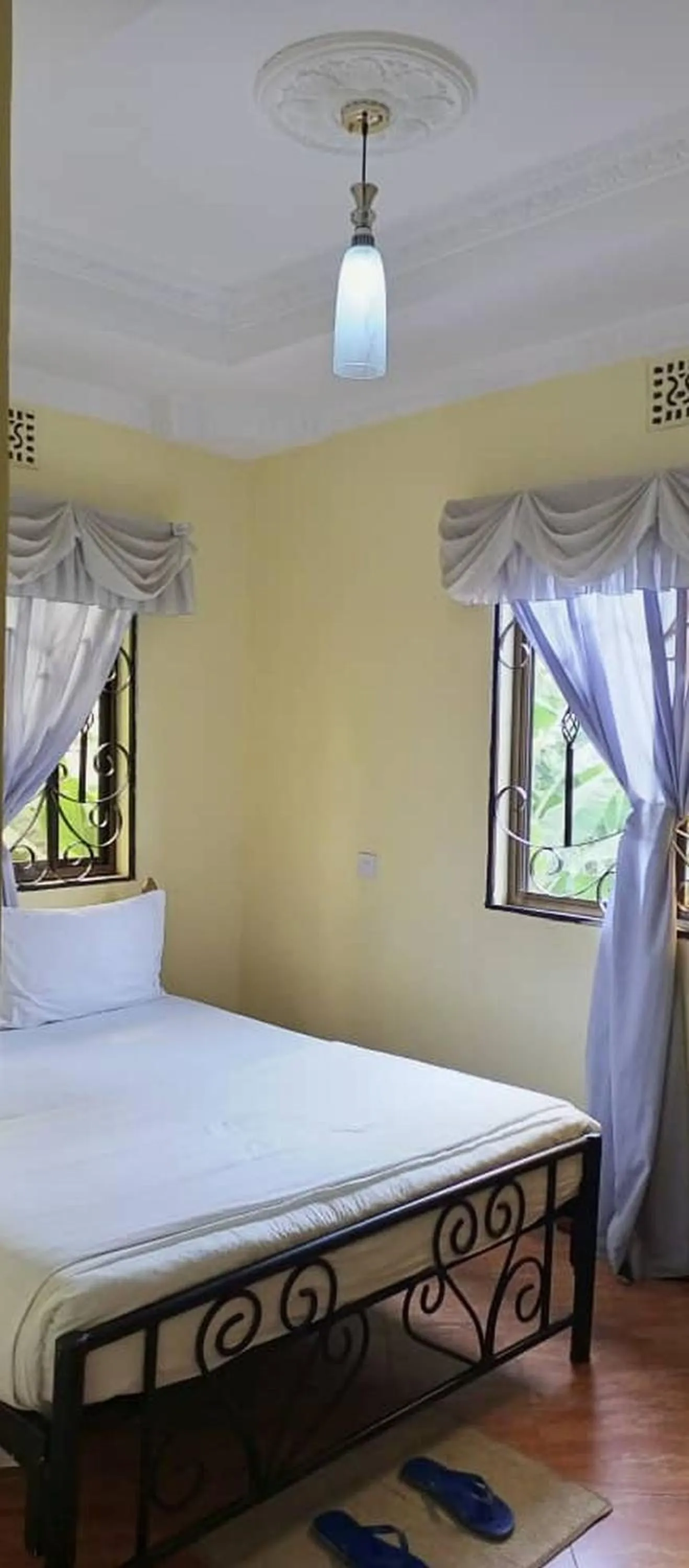 Bed in Bright Star Hotel & Safaris