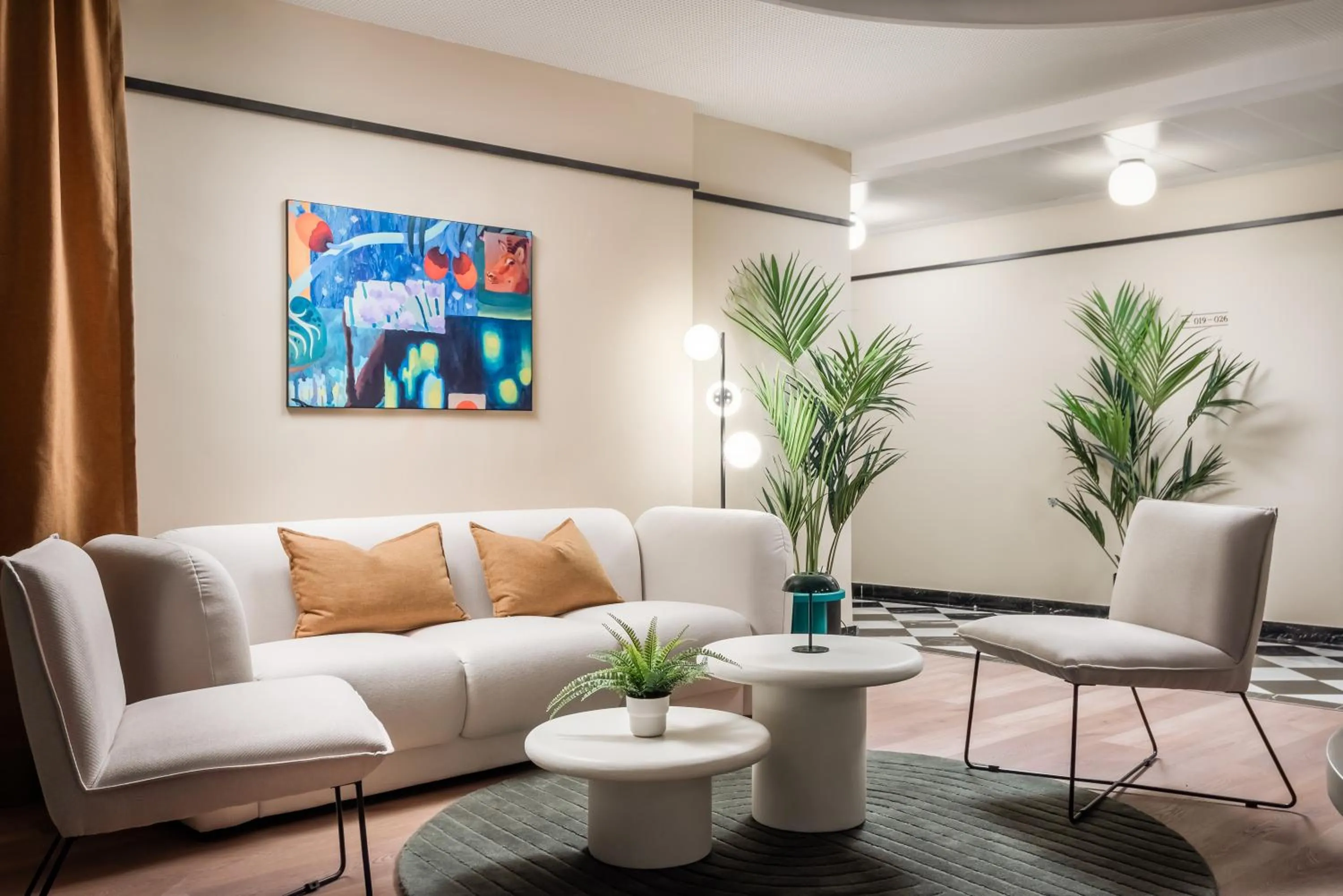 Seating area in BYPILLOW Amari