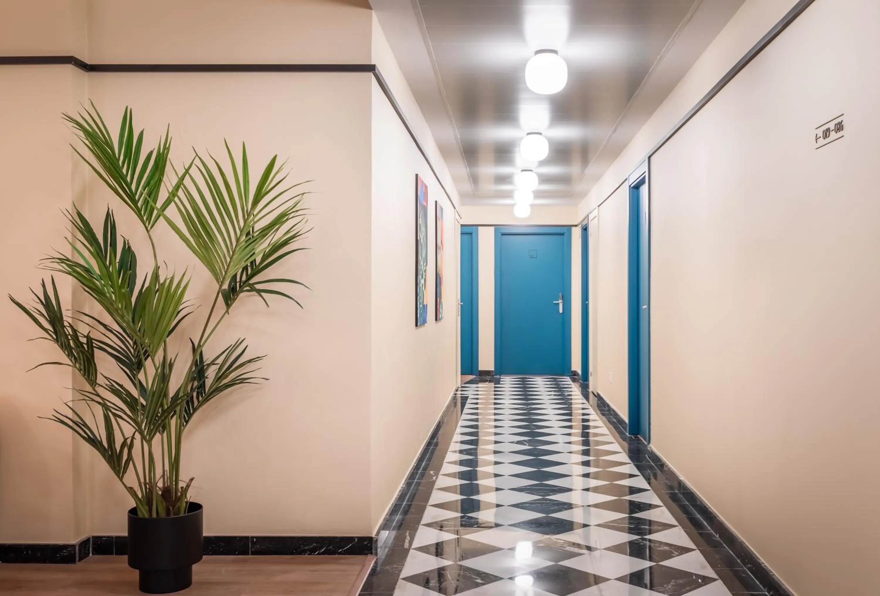 Seating area in BYPILLOW Amari