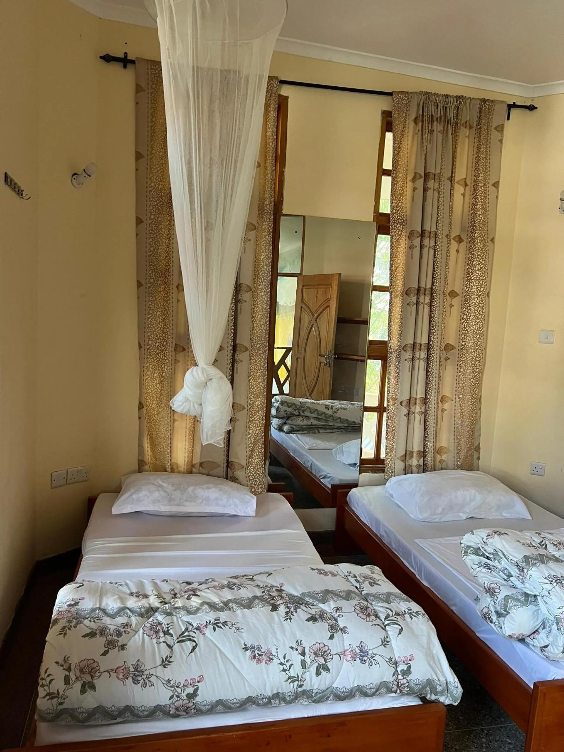 Bed in The Paradise Inn Kilimanjaro
