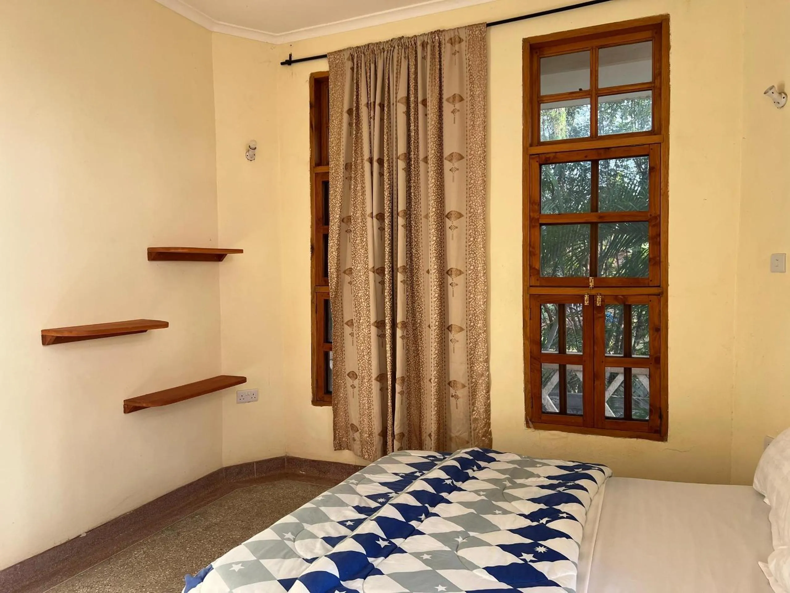 Bed in The Paradise Inn Kilimanjaro