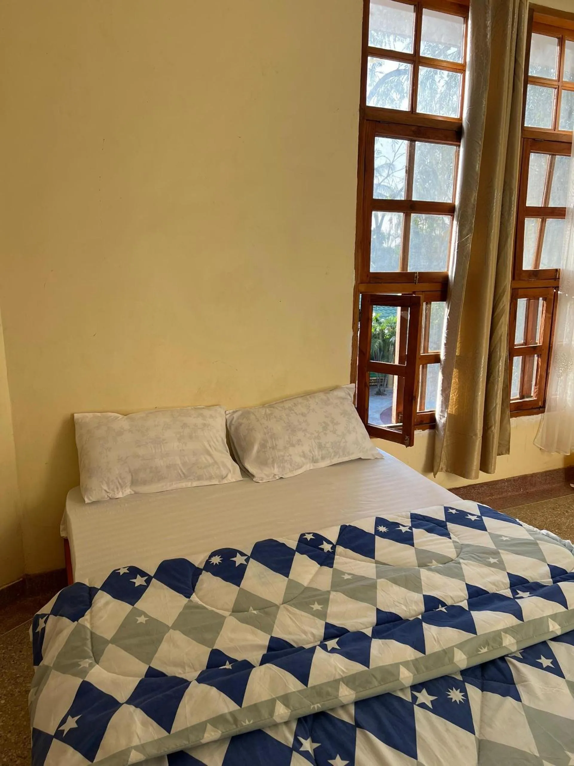 Bed in The Paradise Inn Kilimanjaro