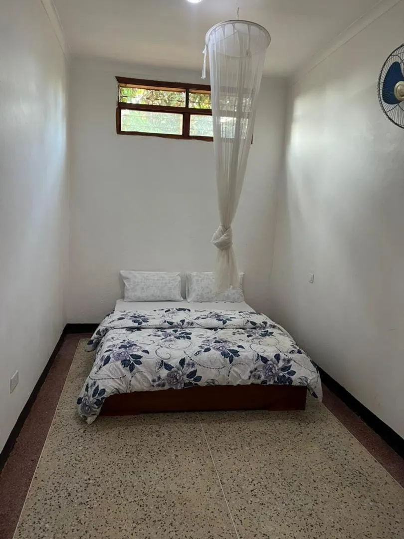 Bed in The Paradise Inn Kilimanjaro