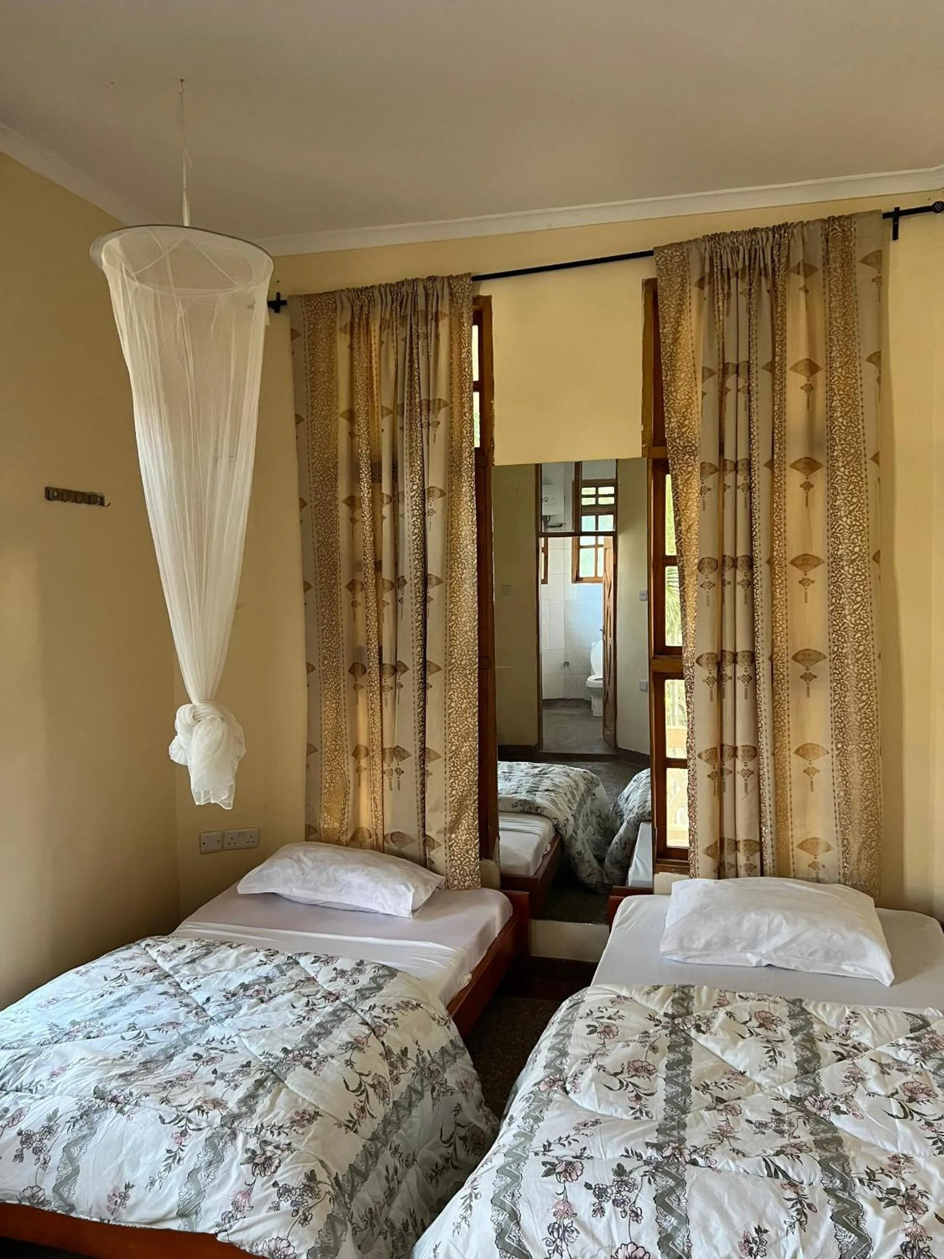 Bed in The Paradise Inn Kilimanjaro