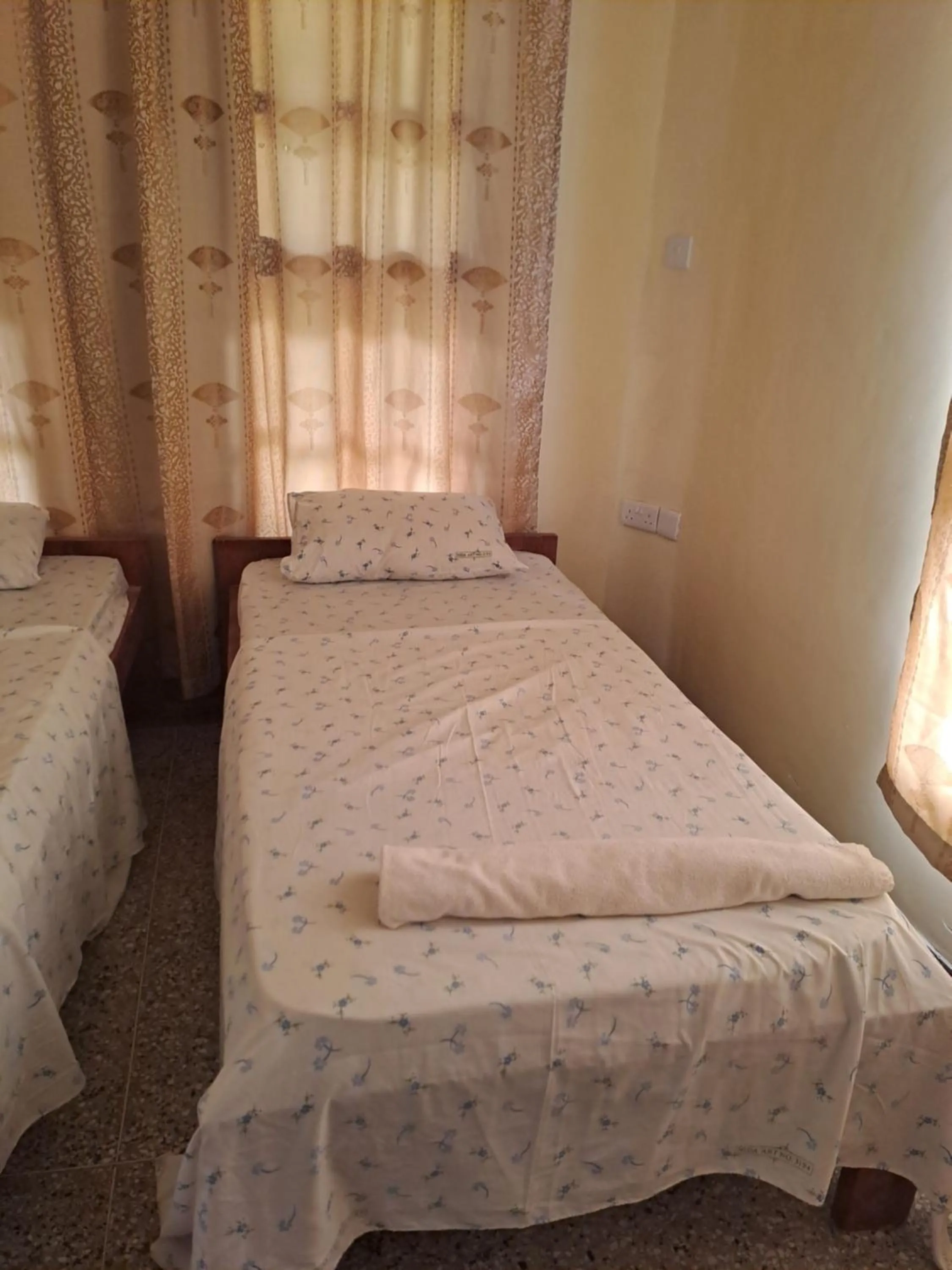 Bed in The Paradise Inn Kilimanjaro