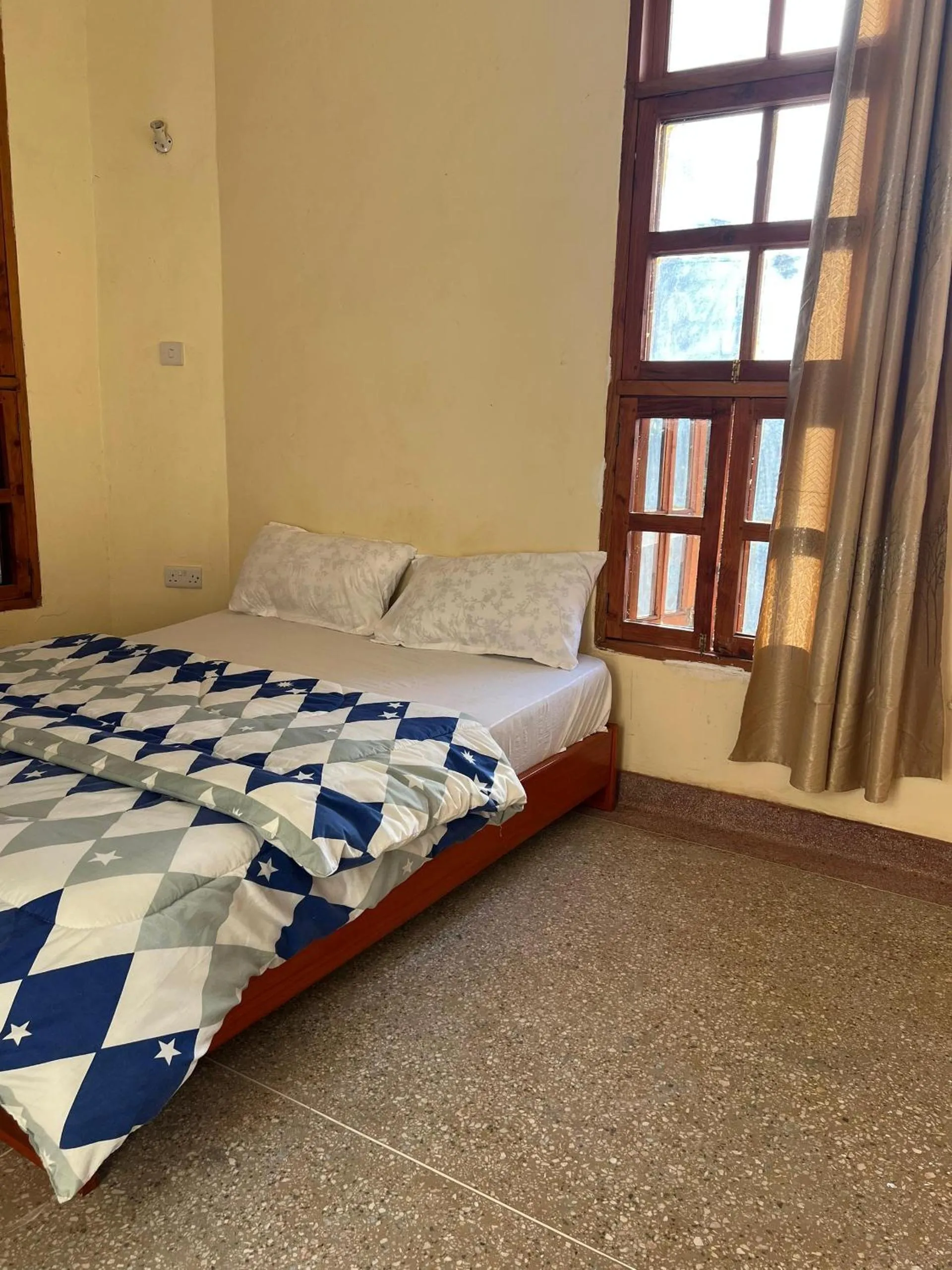 Bed in The Paradise Inn Kilimanjaro