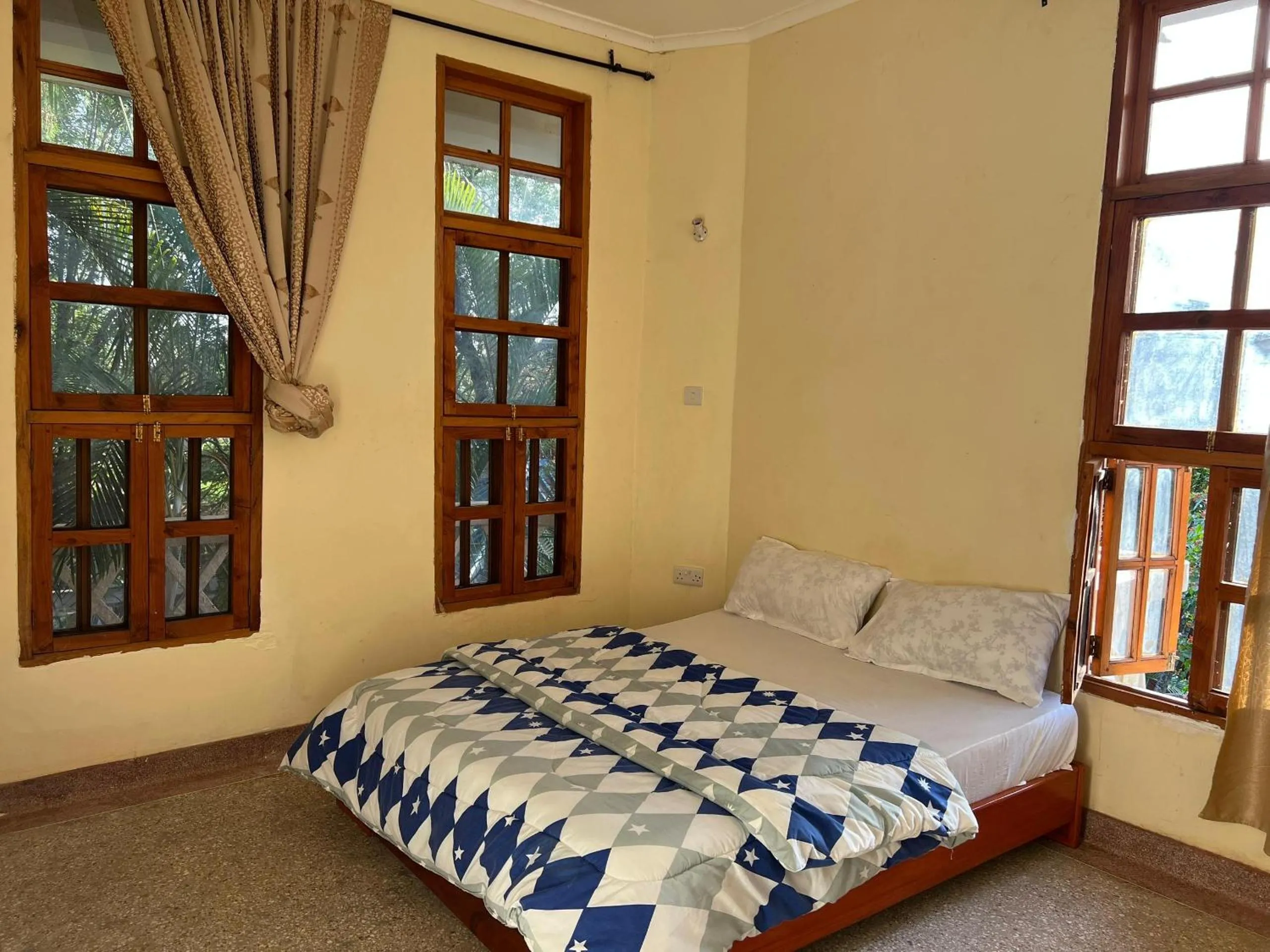 Bed in The Paradise Inn Kilimanjaro